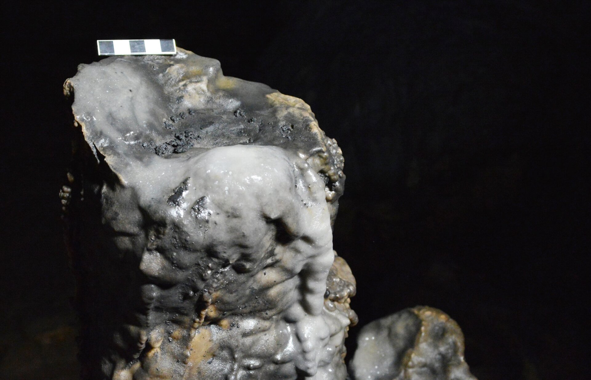 Charcoal residue in stalagmites are evidence of stationary lamps.