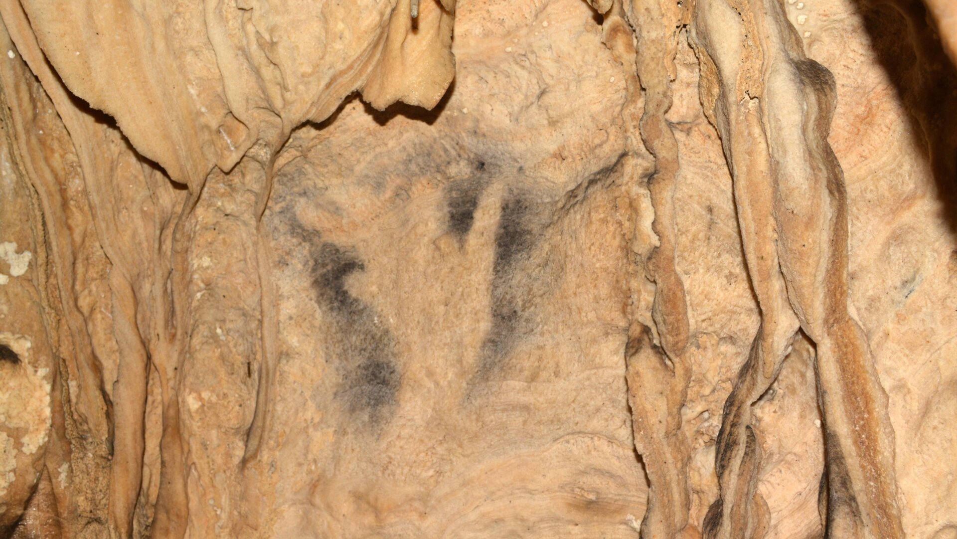 A hand stencil on one of the cave walls.