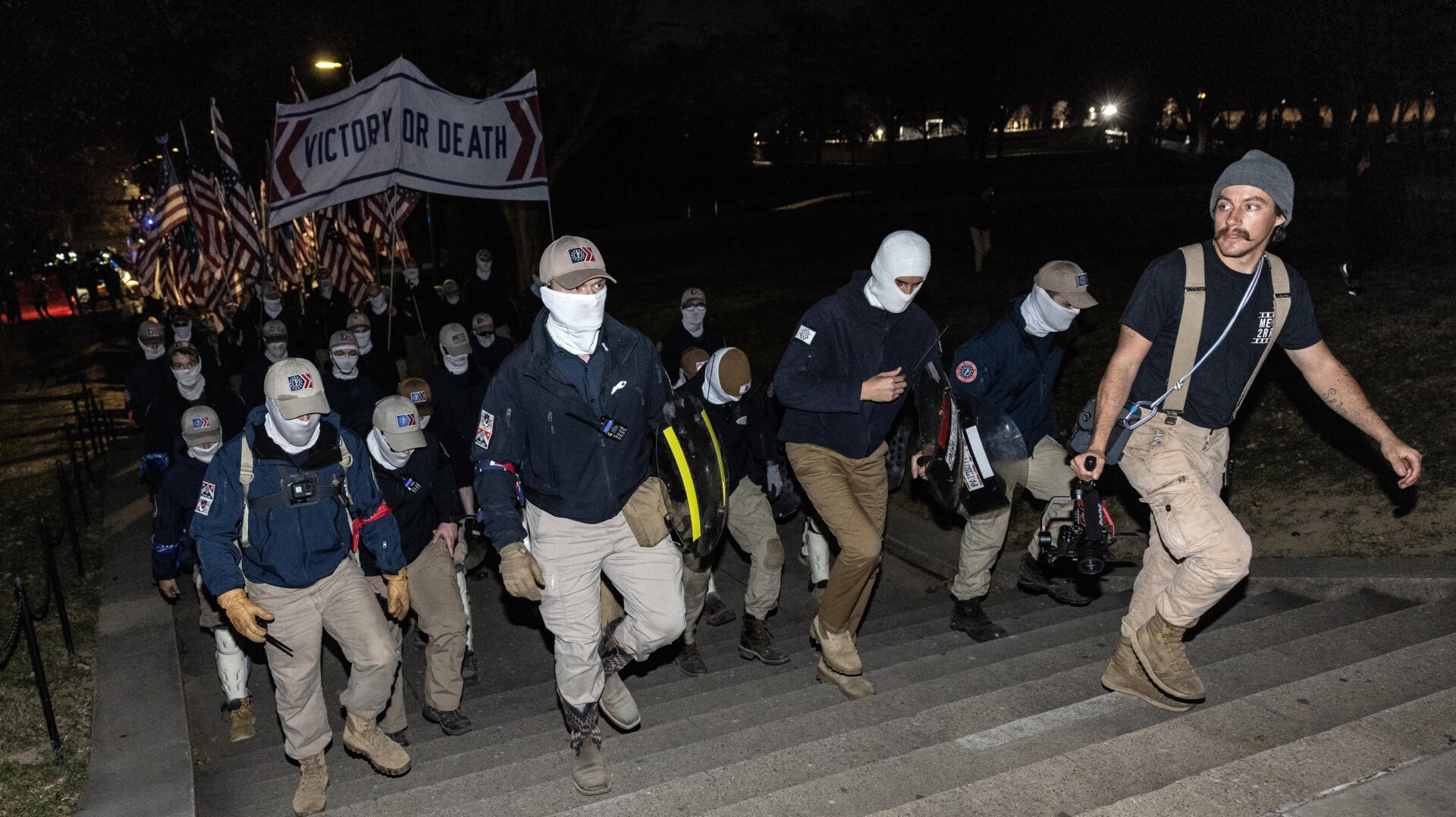 Members of the rightwing group Patriot Front march along the National Mall near the Lincoln Memorial on December 04, 2021 in Washington, DC. 