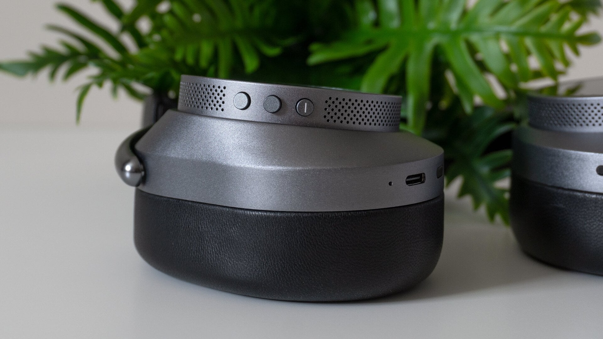 The Master & Dynamic MW75s feature dedicated volume up and down buttons on the right ear cup, as well as a separate button for playback control.