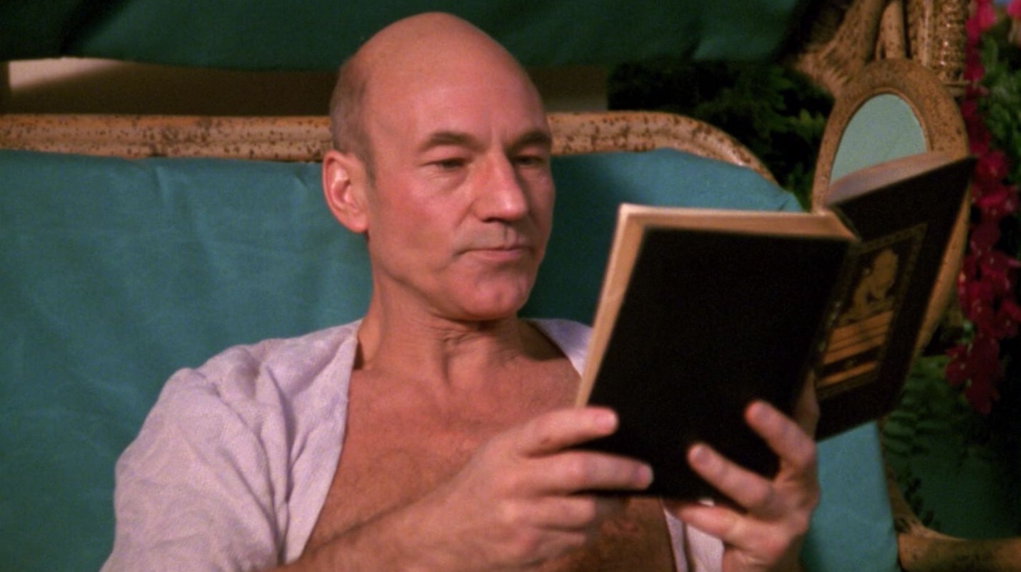 The episode is absolutely 100% about Picard reading this book with his chest on display, absolutely, nothing else happens.
