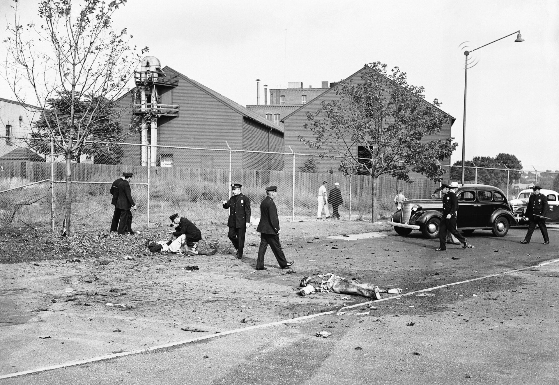 Bodies of two New York City detectives who were killed by the explosion  of a bomb on July 4, 1940 in New York City, which they had removed  moments before from the British Pavilion.