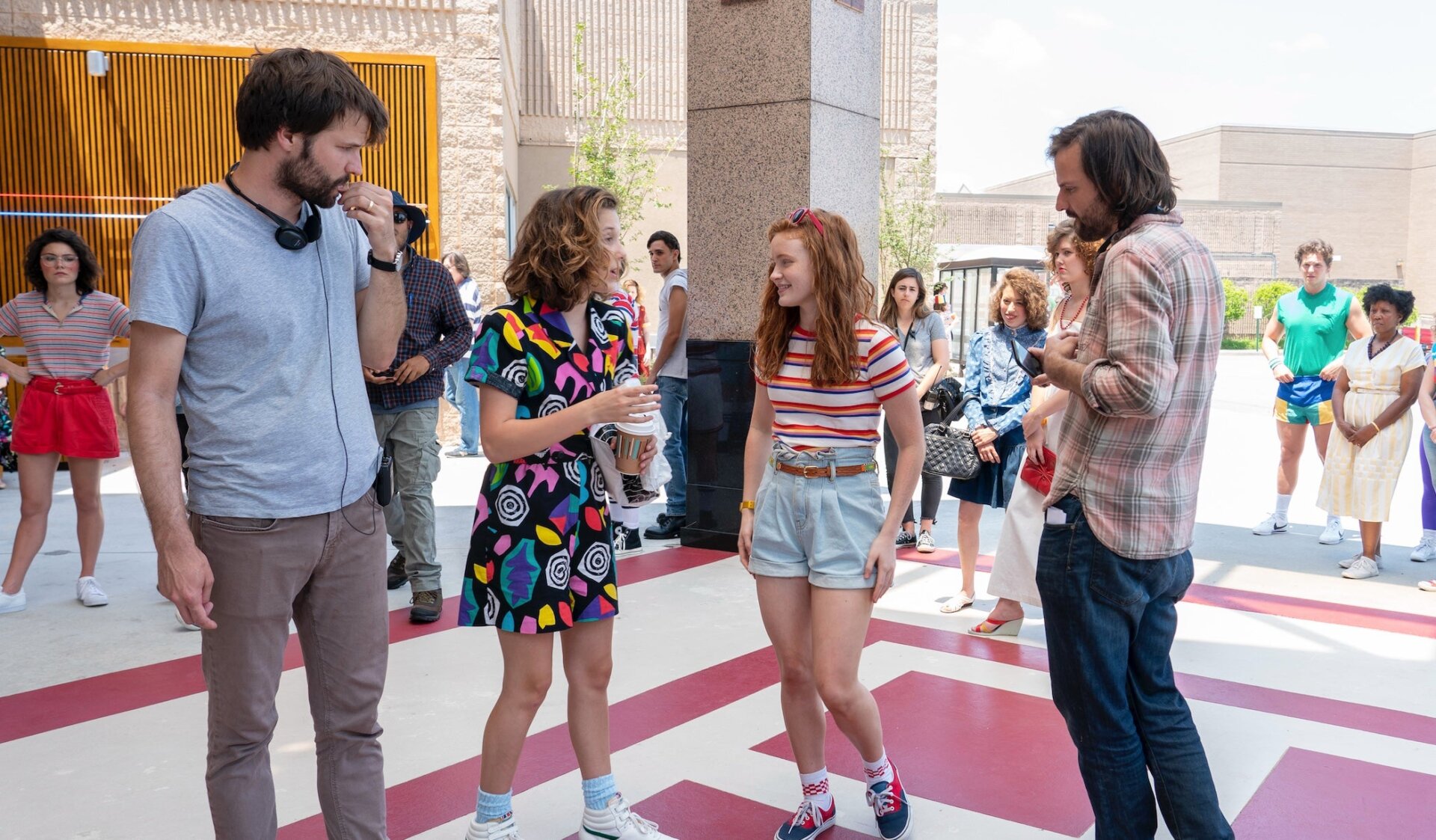 The Duffer Brothers (with Millie Bobby Brown and Sadie Sink) are deeping their Netflix roots.