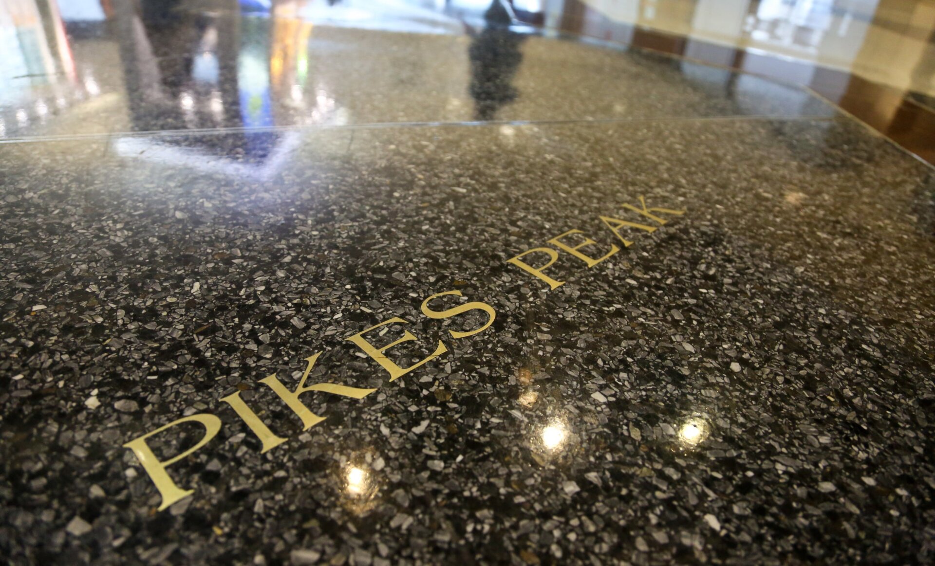 Metal inscriptions in the airport’s floor allude to Colorado’s geologic history (or the airport’s apocalyptic plans).