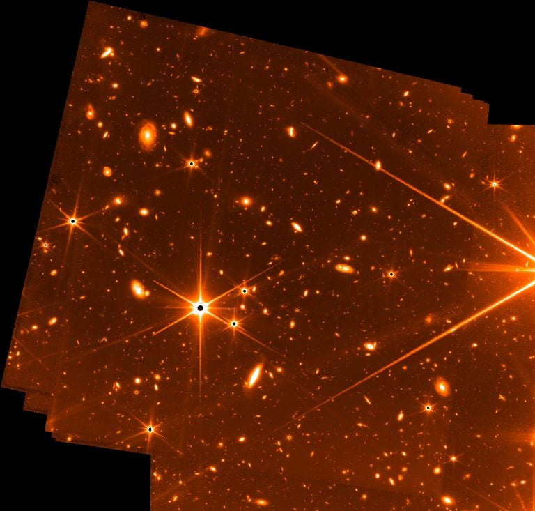 A Fine Guidance Sensor (FGS) test image from Webb shows the star HD147980, among thousands of faint galaxies.
