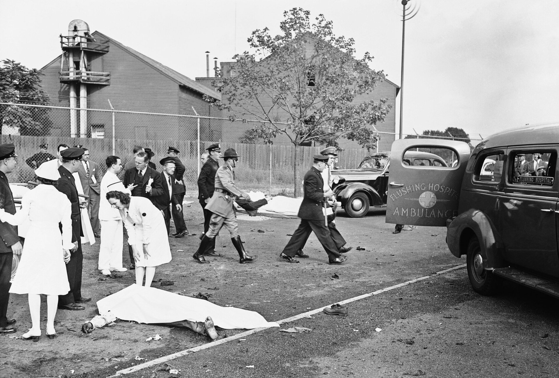 Bodies of two New York City detectives who were killed by the explosion  of a bomb on July 4, 1940 in New York City, which they had removed  moments before from the British Pavilion.