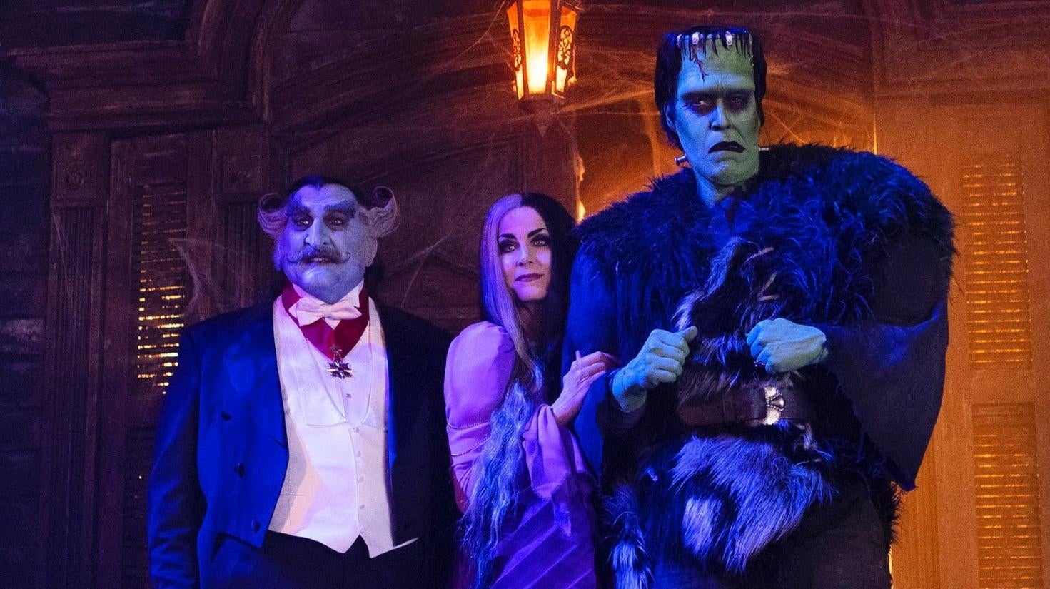 Grandpa (Daniel Roebuck), Lily (Sheri Moon Zombie), and Herman (Jeff Daniel Phillips) in The Munsters.
