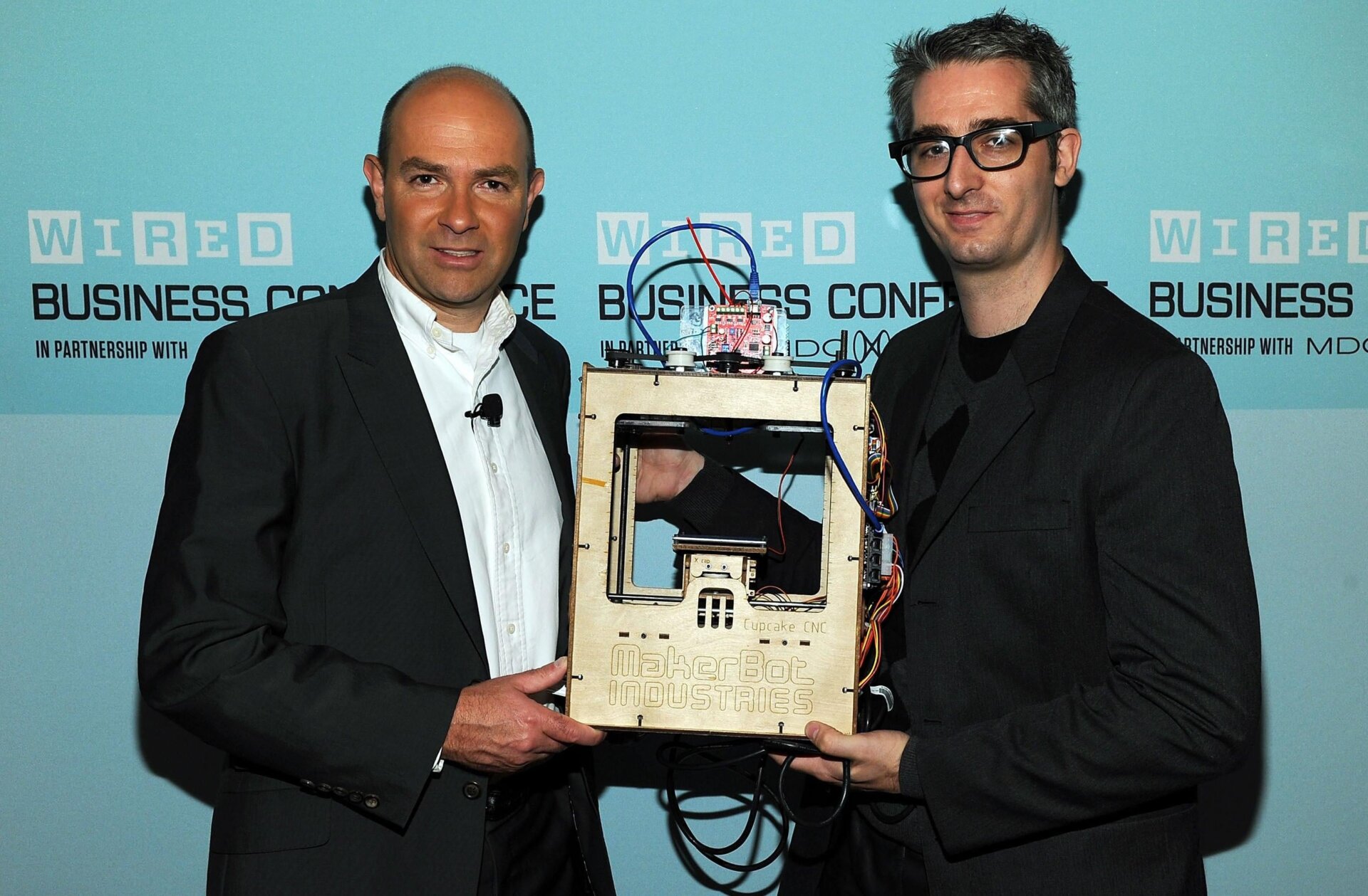 Cofounder of MakerBot Industries Bre Pettis shows off the MakerBot Cupcake CNC at a Wired conference in 2010.