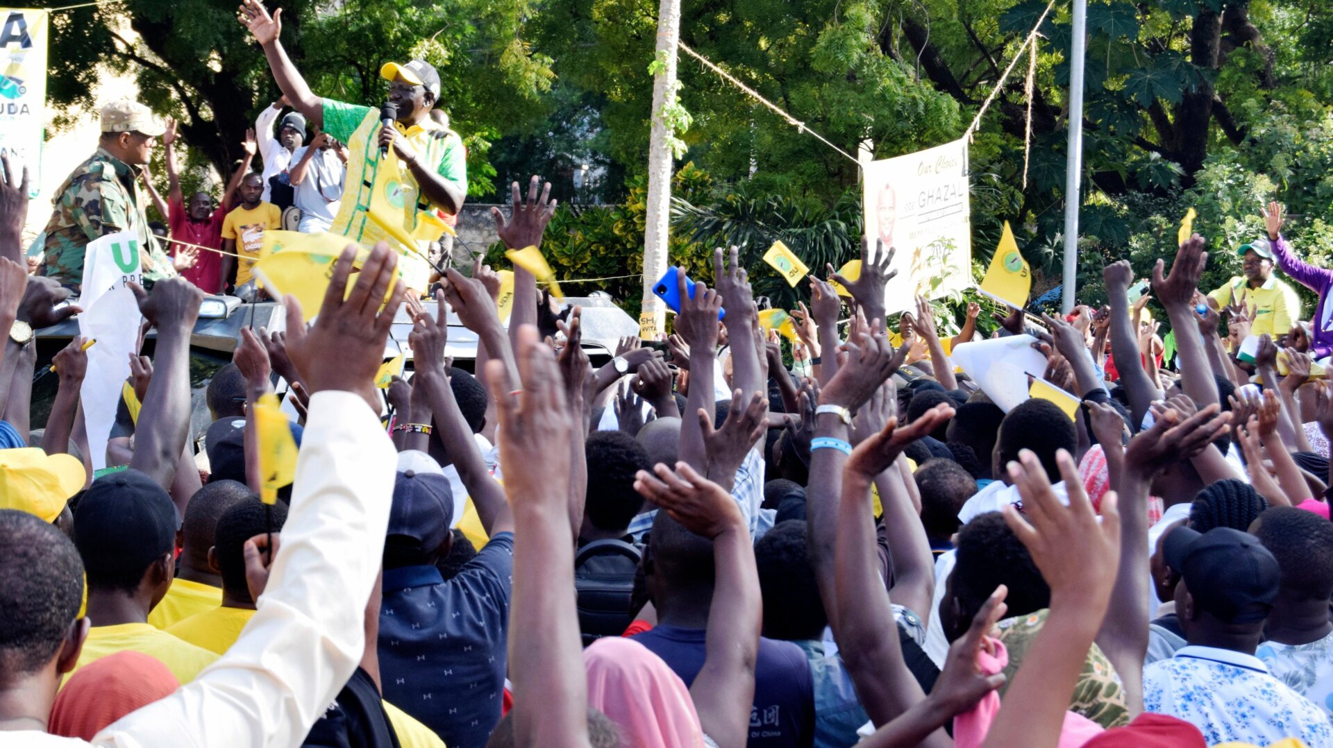 Kenyan voters within Mombasa County in the Coastal town of Mombasa, Kenya, chant and wave as they support Kenya Kwanza Alliance Presidential candidate William Ruto campaigning out the Fort Jesus National Museum, Friday, July 22, 2022.