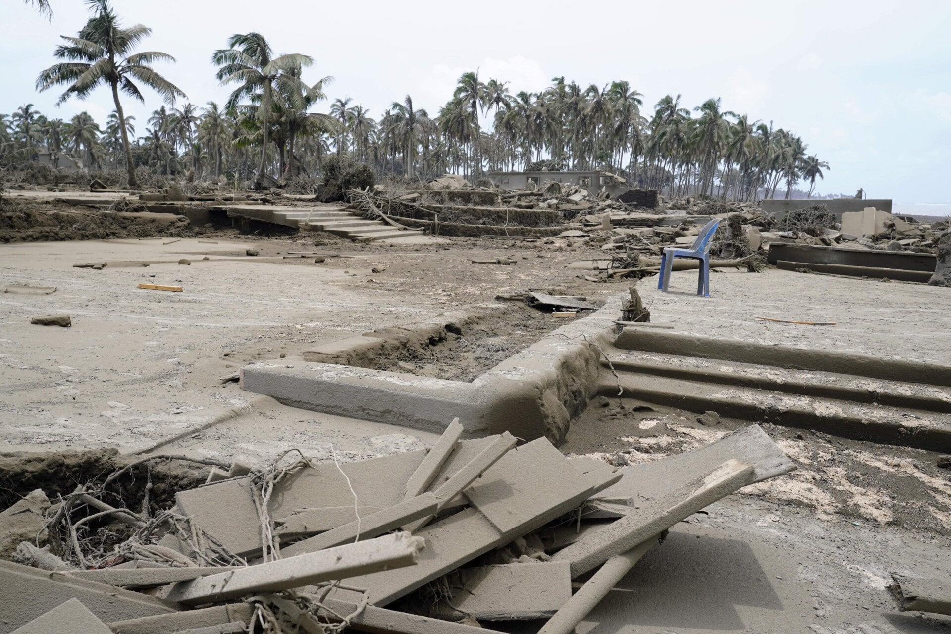 This photo taken on January 16, 2022 shows destroyed beach resorts in the Hihifo district of Tonga’s main island Tongatapu following the January 15 eruption of the nearby Hunga Tonga-Hunga Ha’apai underwater volcano.