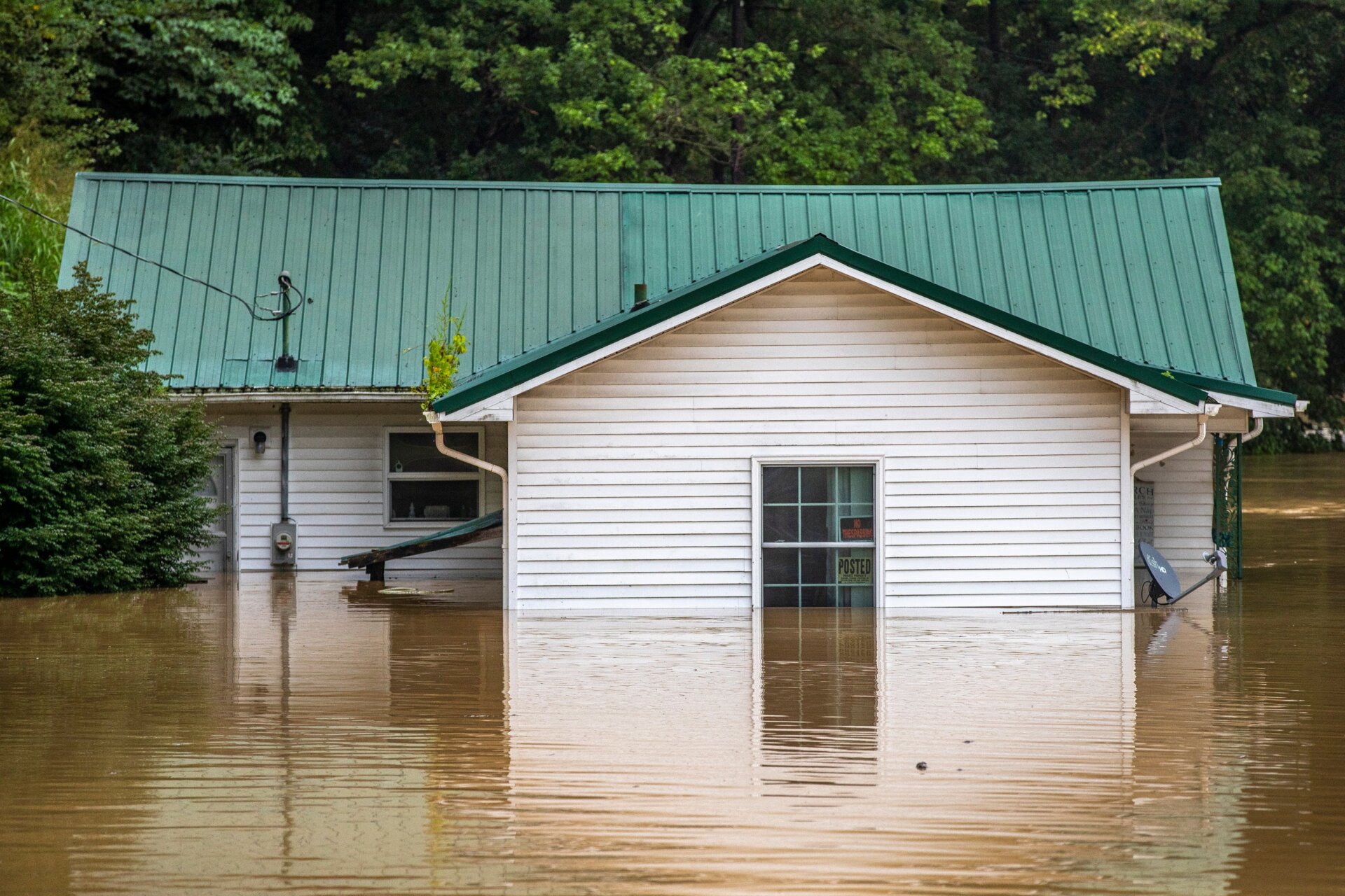 A home in floodwaters in Lost Creek, KY on July 28, 2022.
