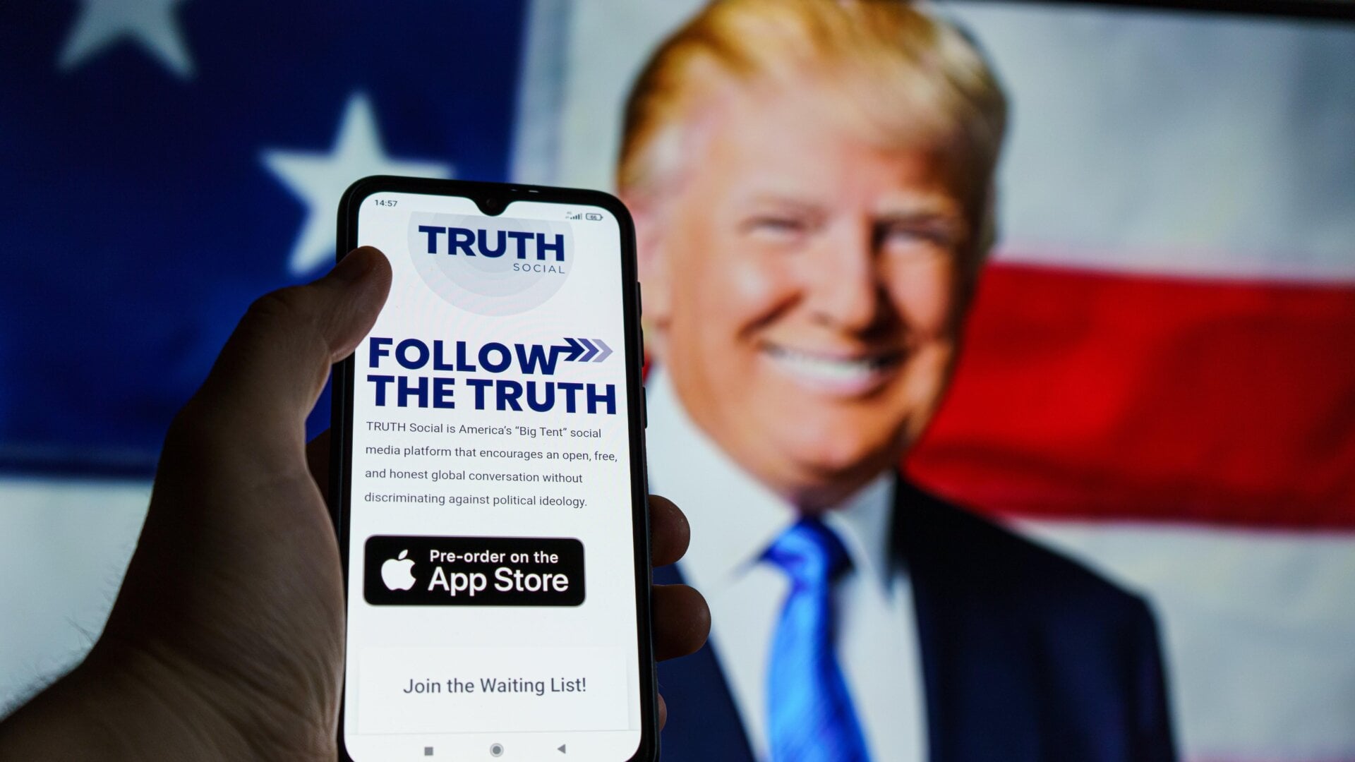 As Trump looms in the back of this image, even more troubles are looming on the horizon for Truth Social.