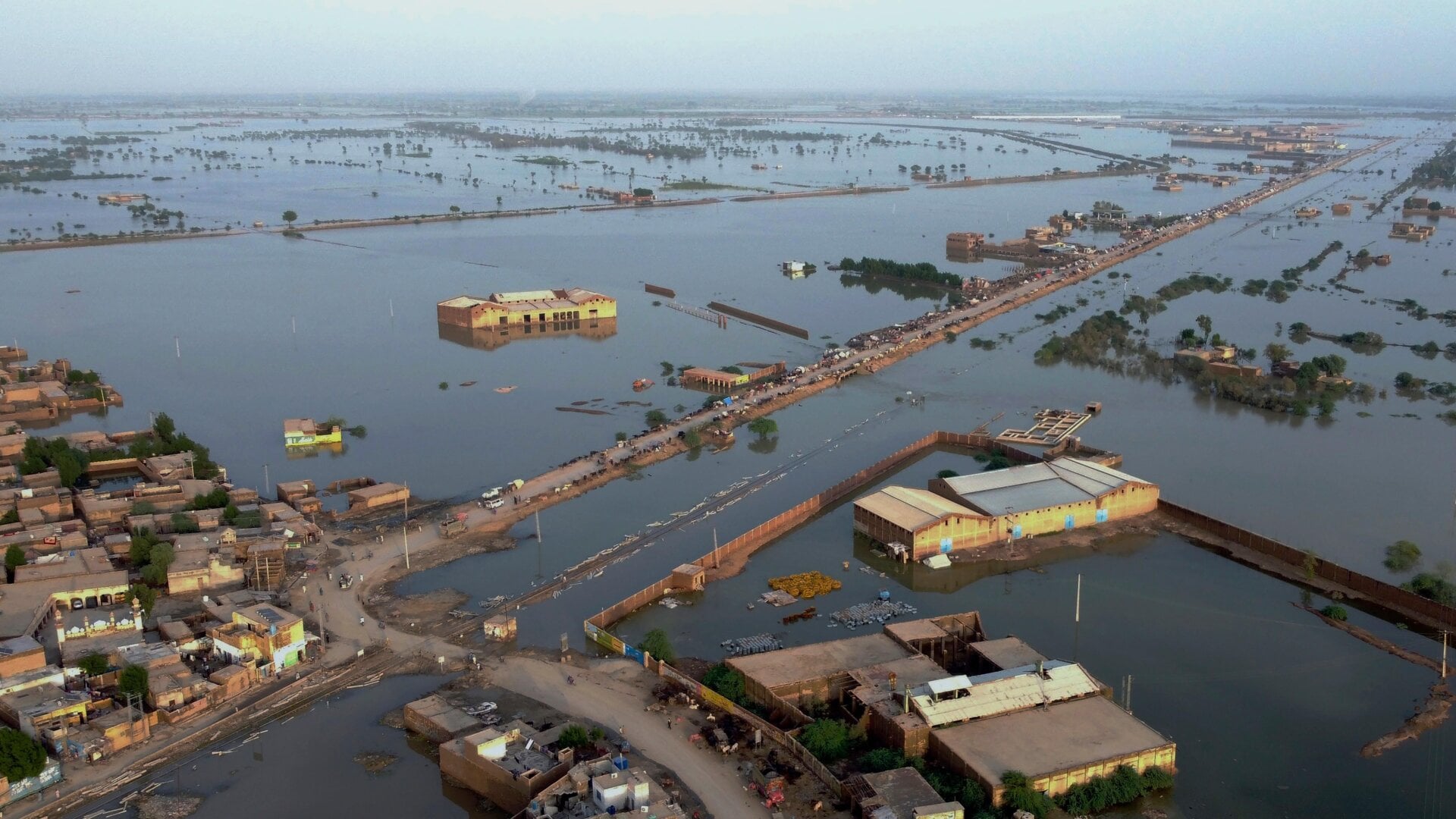 Climate change and a legacy of British colonial rule contributed to the ongoing humanitarian crisis in Pakistan, a new report says.