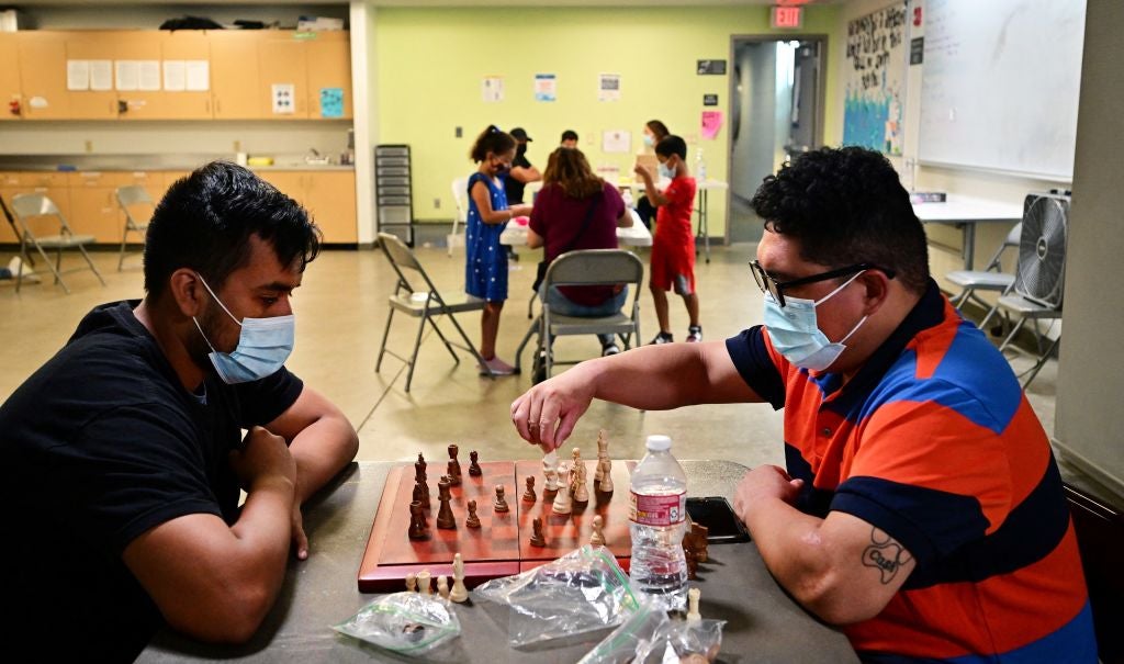 People keep active at the the Lafayette Recreation Center cooling center in Los Angeles, California, on September 2, 2022. 