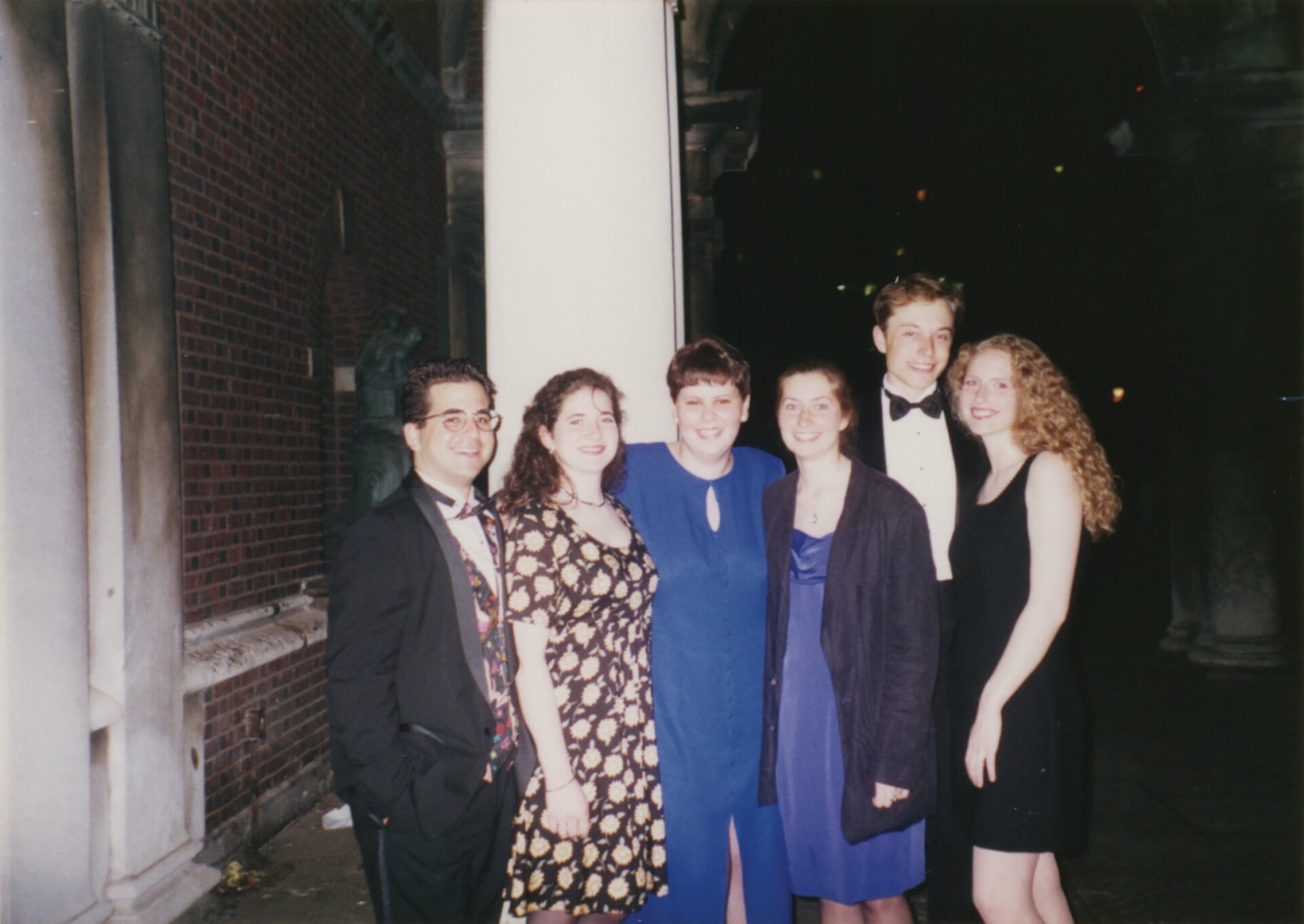 Elon Musk and Jennifer Gwynne (right) pose with other, fellow Resident Advisors before an end-of-year formall at UPenn.