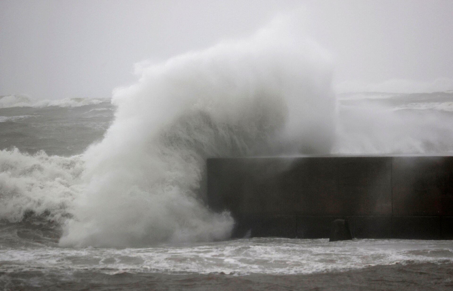 Waves crash off the shore of the city of Miyazaki on Sunday, September 18 as Typhoon Nanmadol approached Japan.