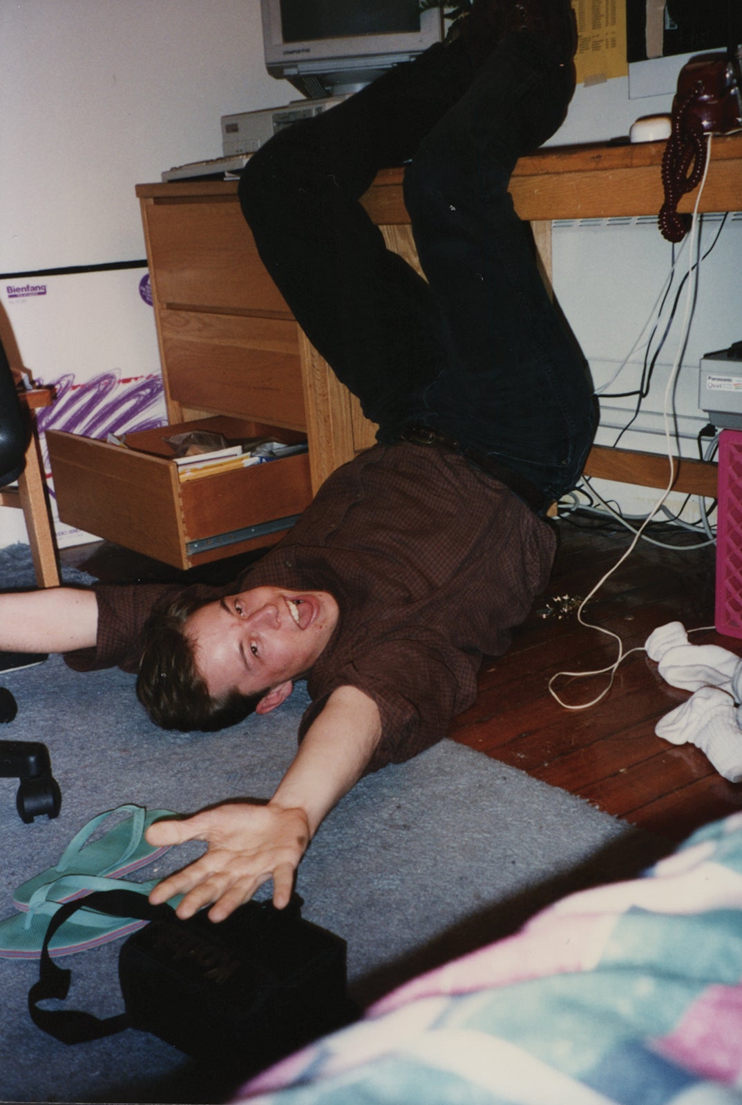 Young Musk “goofing about upside down on the floor,” captured by Gwynne in her dorm room. 