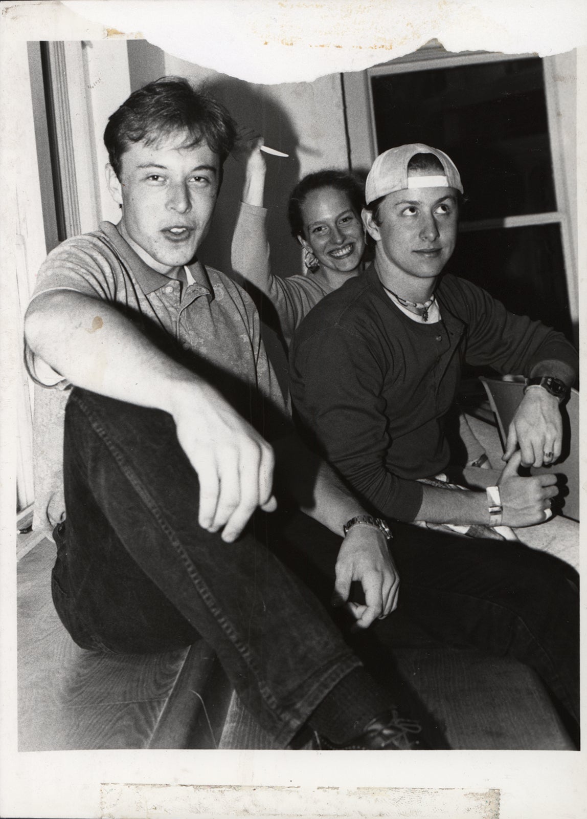 Candid photo of Musk with Gwynne and another friend at an RA staff meeting.