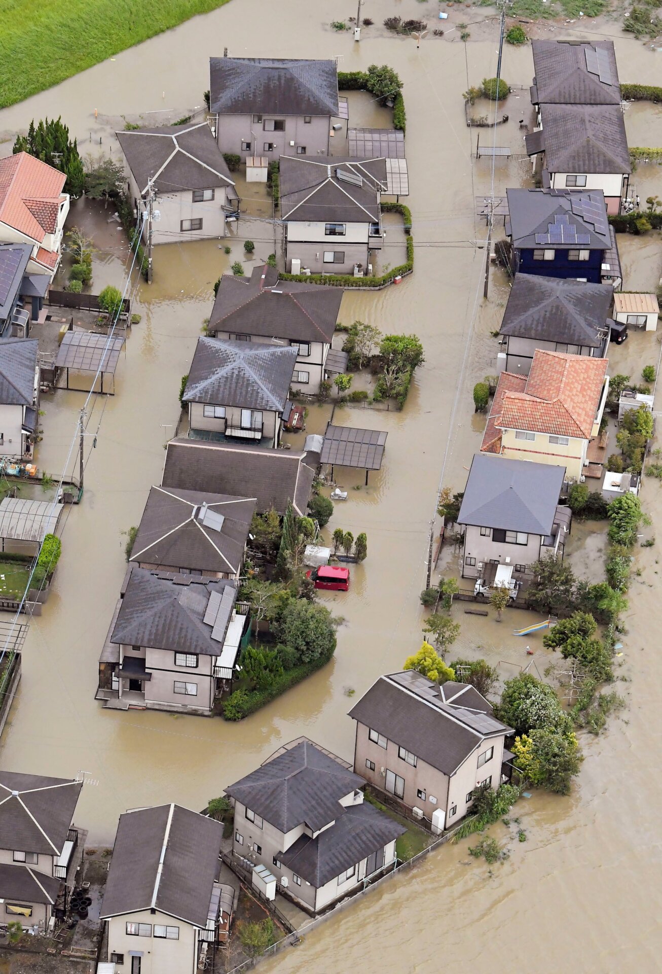 Flooded homes in Kunitomi in Miyazaki Prefecture on September 19.
