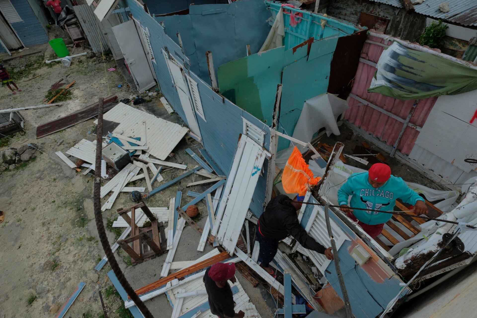 Efforts to repair the damage are already underway in Veron de Punta Cana, Dominican Republic. On Monday, residents of the neighborhood Kosovo worked to replace a roof.
