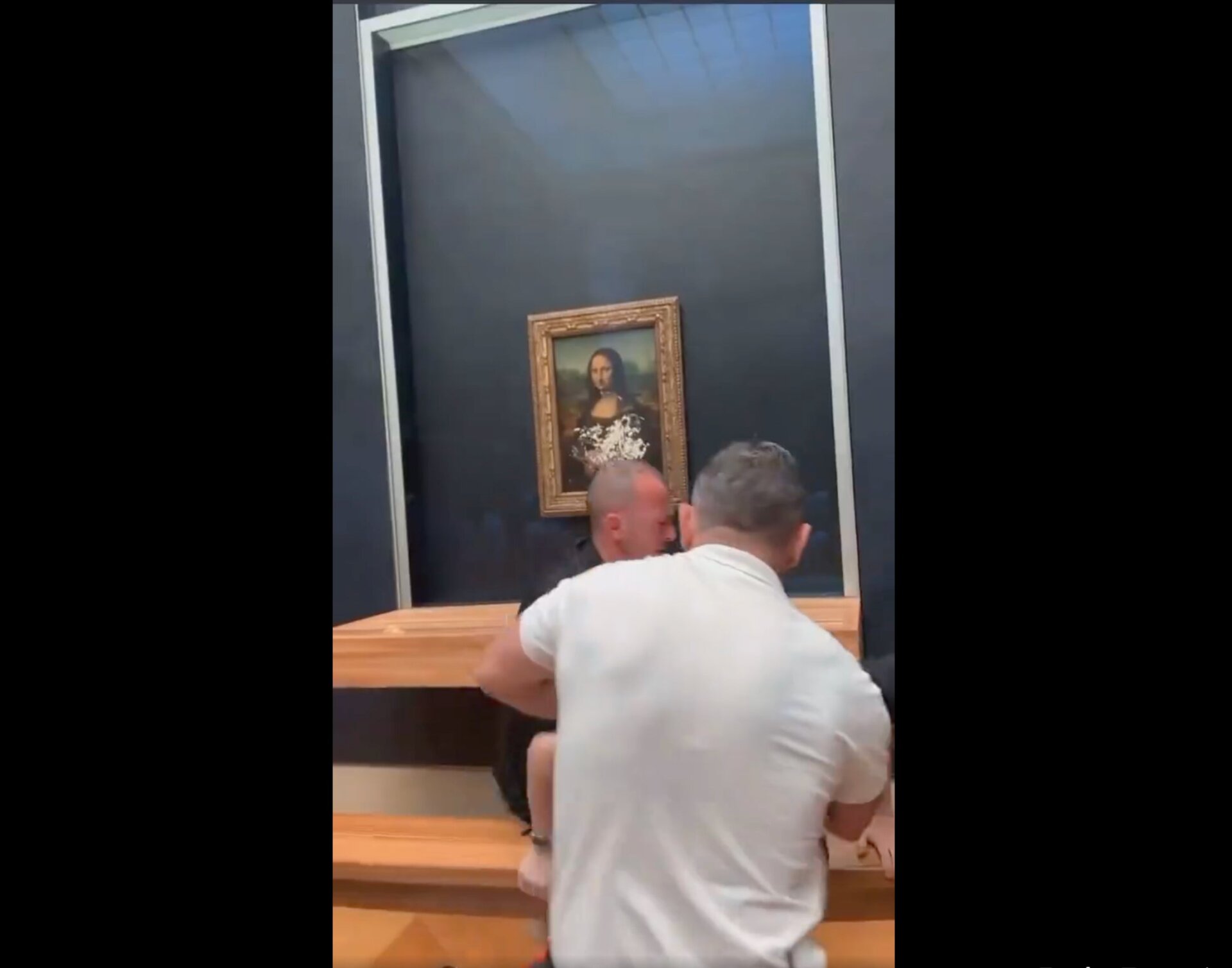 Why the wig, tho? And the rose?