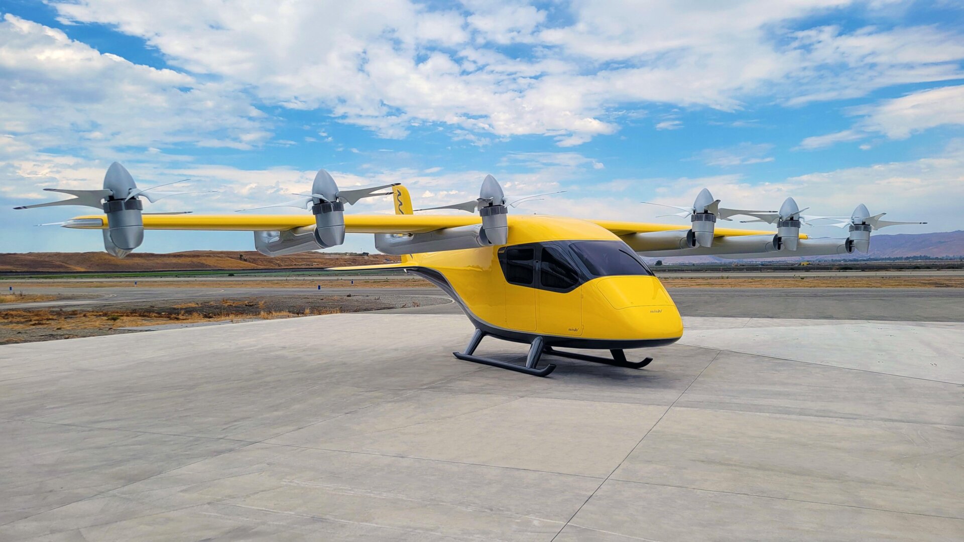 The Wisk 6th generation aircraft continues from the 5th generation “Cora” design but expands the cabin and replaces wheels with skis, meaning any takeoff needs to be done VTOL-style.