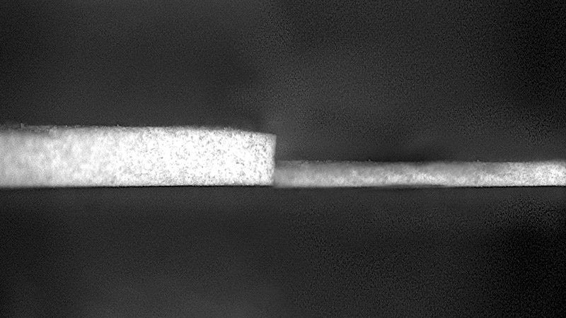 “Purdue University researchers have created a new formula for the world’s whitest paint, making it thinner and lighter. The previous iteration (left) required a layer 0.4 millimeters thick to achieve sub-ambient radiant cooling. The new formulation can achieve similar cooling with a layer just 0.15 millimeters thick. This is thin and light enough for its radiant cooling effects to be applied to vehicles like cars, trains and airplanes.”