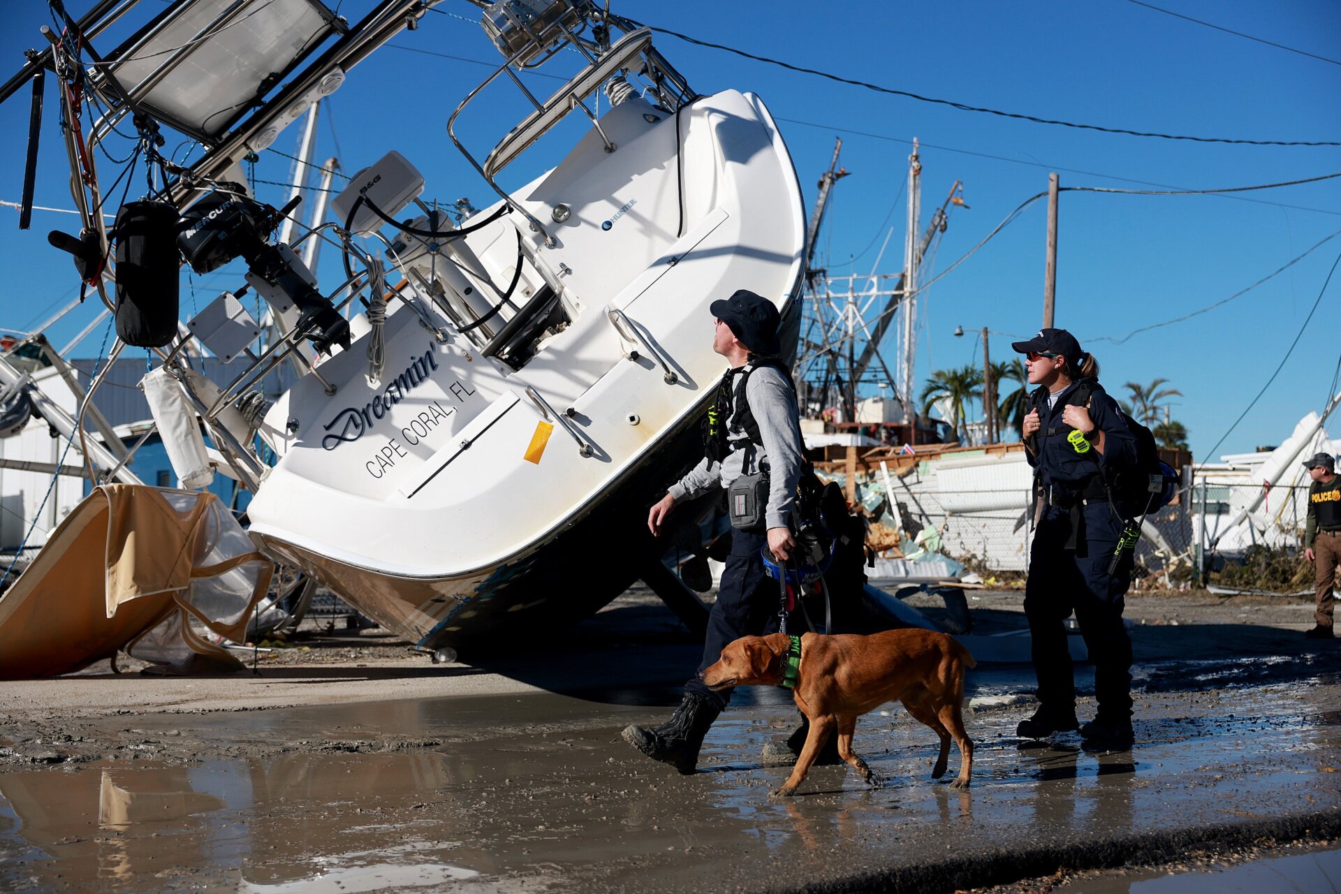 Rescuers look for survivors in Fort Myers on Saturday, October 1.
