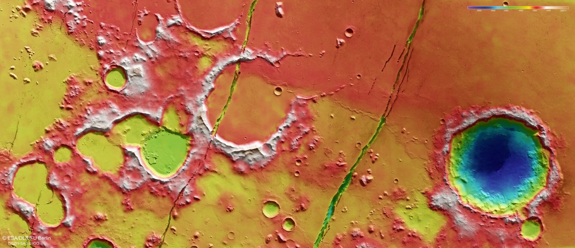 A topographical view of Cerberus Fossae, an ancient volcanic region on Mars characterized by large rifts.