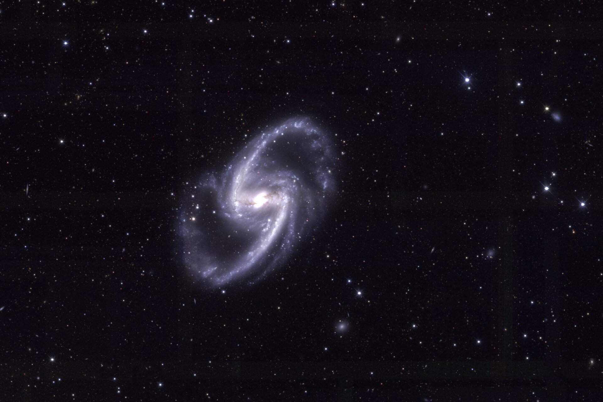 A view of the barred spiral galaxy NGC 1365.