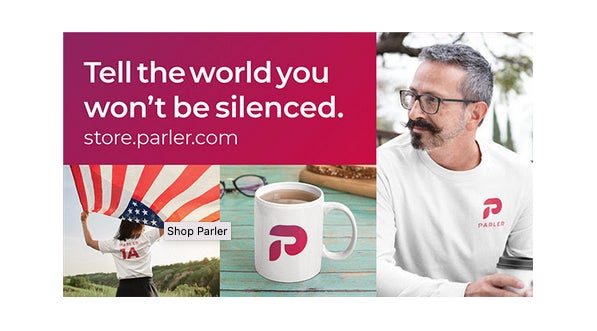 A handsome man wearing a handsome shirt in a promo for Parler merch.