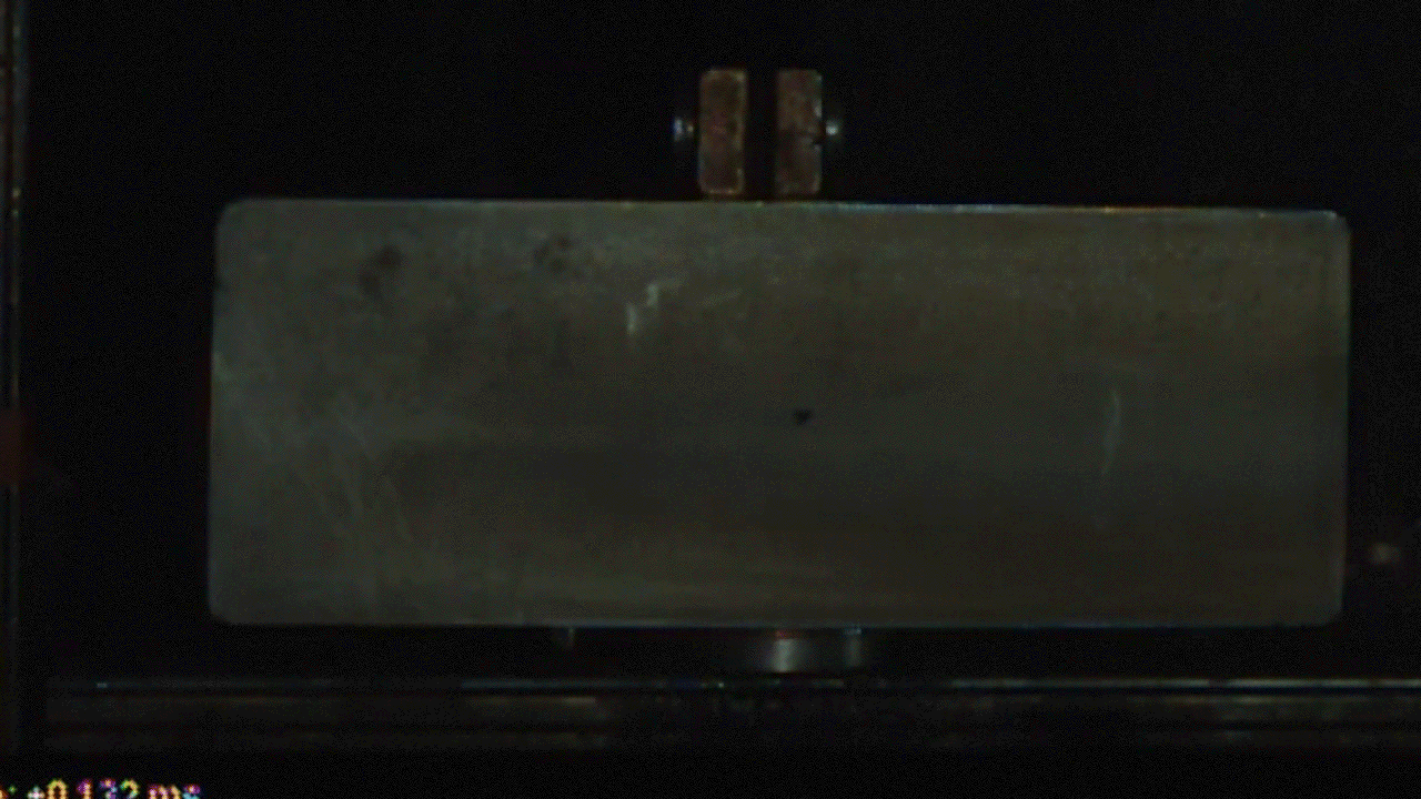 A previous test at White Sands shows a pellet serving as a micrometeroid analog slamming into a piece of metal.