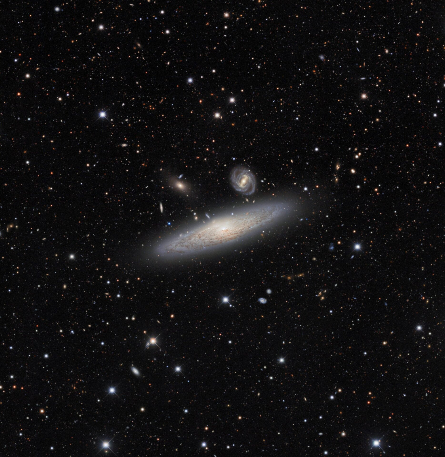 A group of galaxies, with NGC 1515 at its center.