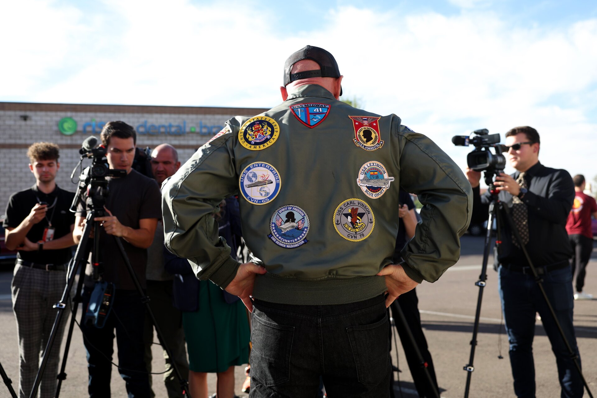 U.S. Sen. Mark Kelly (D-AZ) speaks to the media at a canvasing location at Llantera Garcia’s Auto Service on November 07, 2022 in Tucson, Arizona.