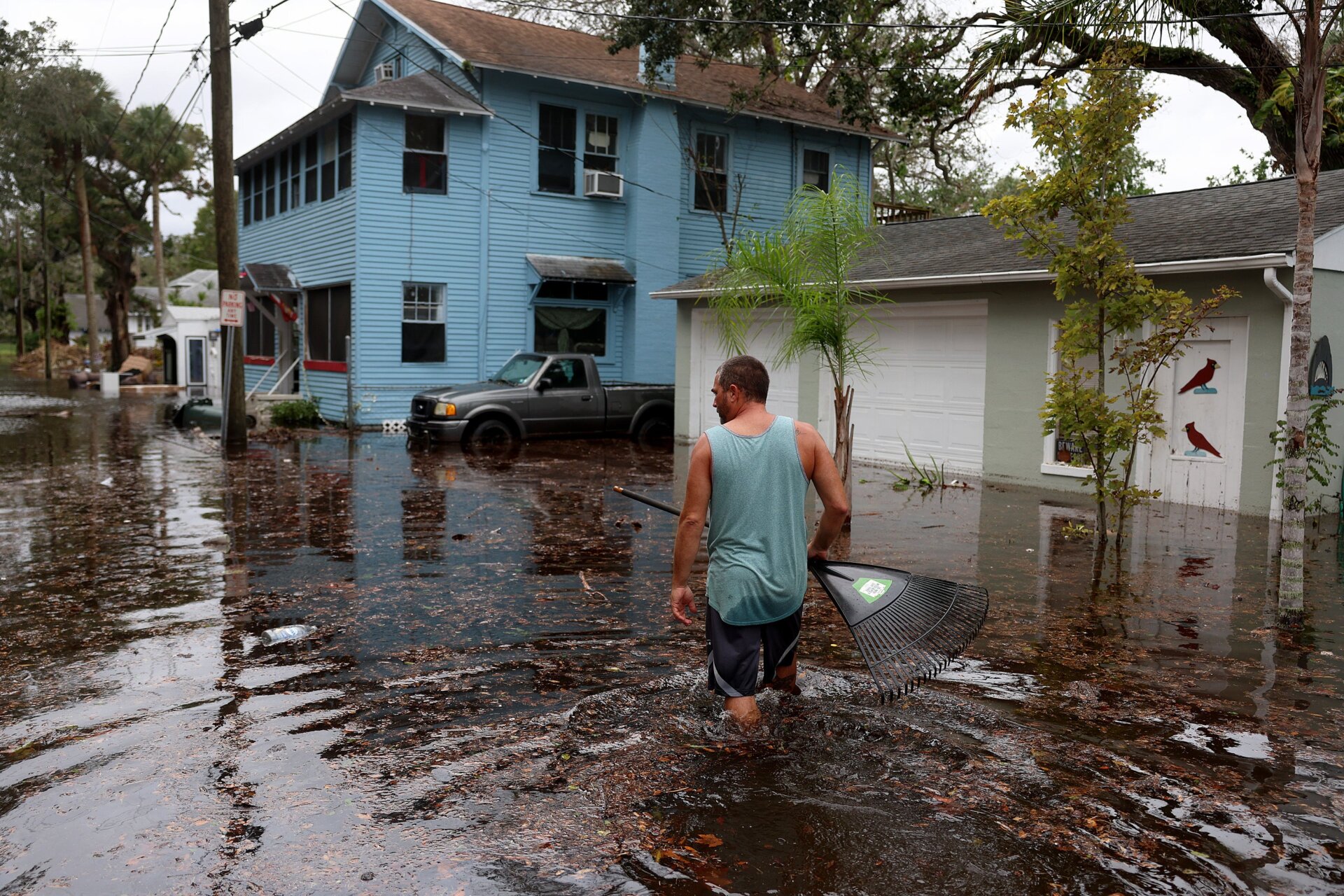 Jason Elam’s home was surrounded by floodwaters in Daytona Beach, Florida. Wading in floodwater after a hurricane can be dangerous because of contaminants and debris in the water.