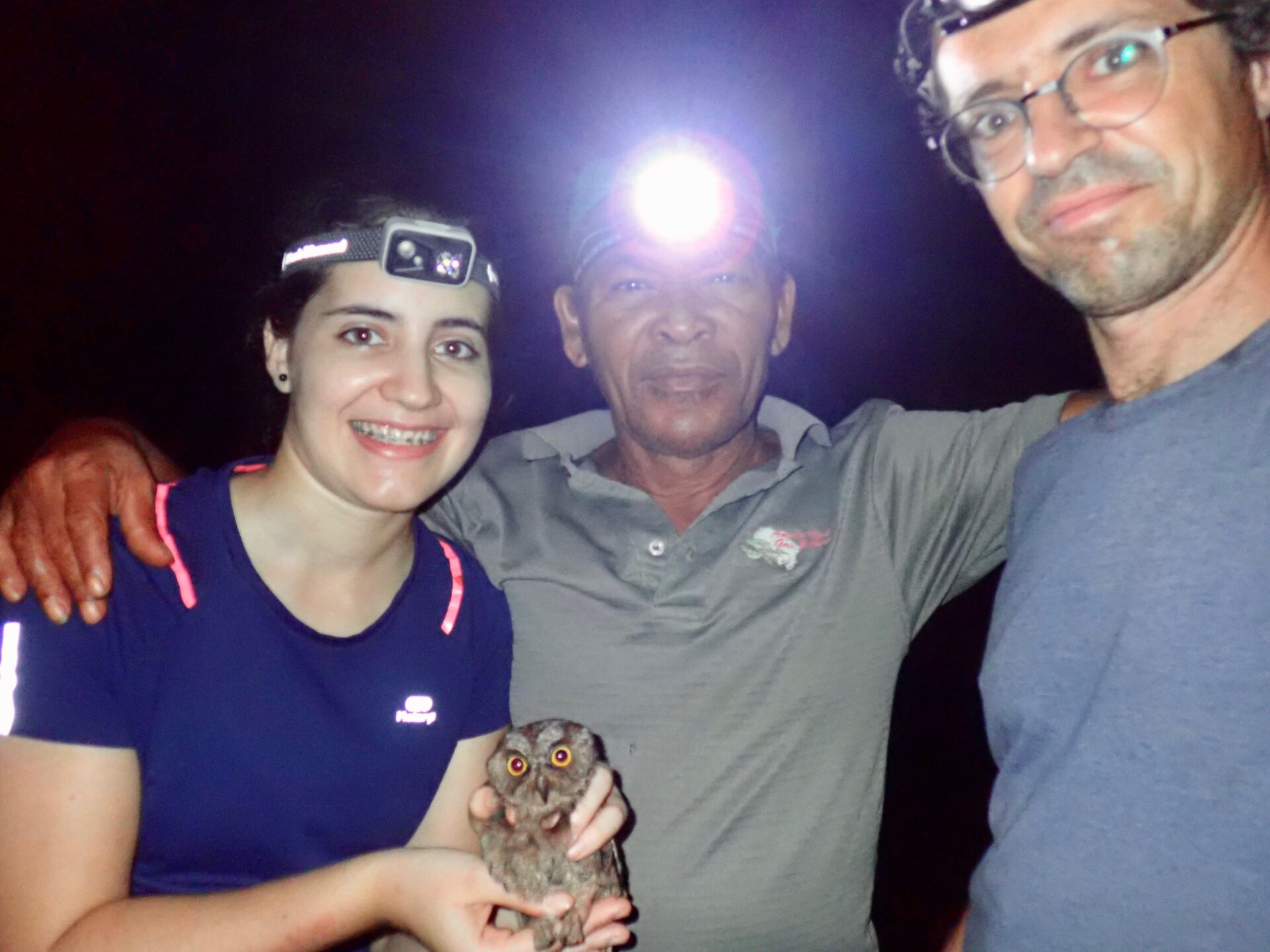 Three members of the research team, plus owl: (Left to Right) Bárbara Freitas, Ceciliano do Bom Jesus aka ‘Bikegila’, and Martim Melo. 