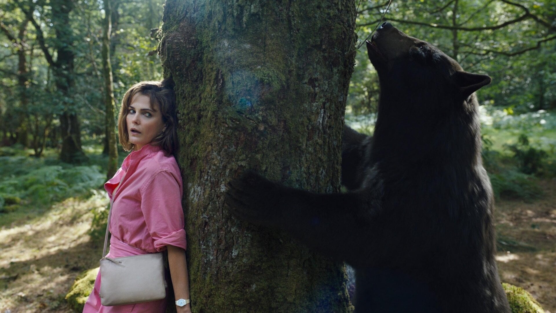 Keri Russell and the titular star of Cocaine Bear.