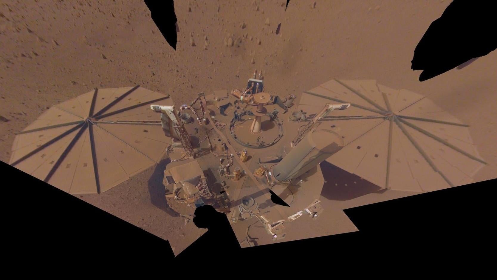 InSight’s final selfie on Mars. Note the dust-covered solar panels.