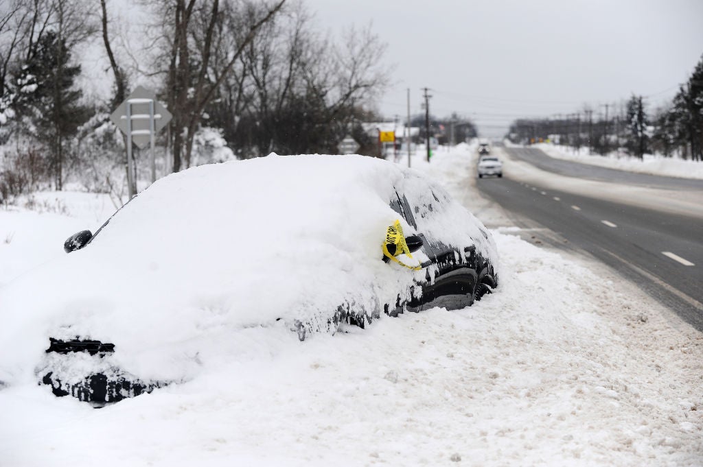 A car is abandoned along Southwestern Boulevard on December 26, 2022 in West Seneca, New York. 