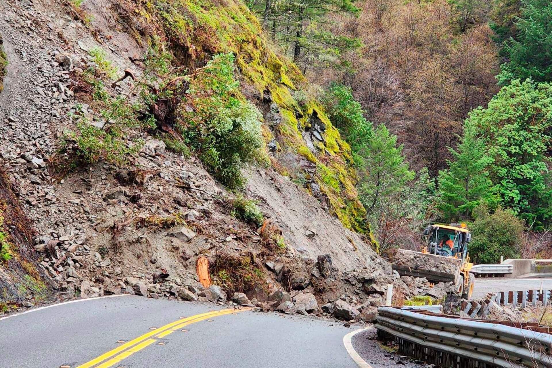 The heavy rain triggered landslides that also blocked roads, like this one on State Route 299 in Trinity County. Areas burned in recent wildfires are particularly susceptible to landslides. 