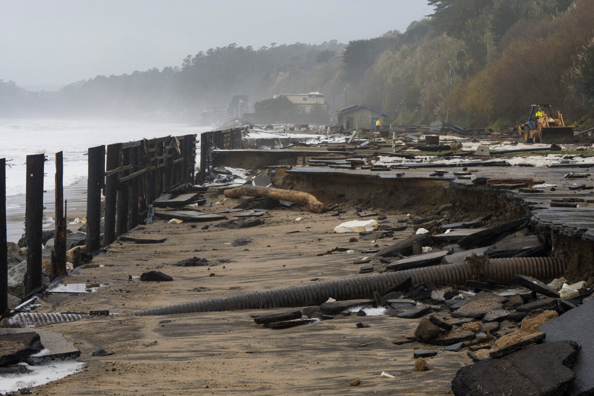 A parking lot at Seacliff State Beach is damaged by heavy storm surge, Thursday, Jan. 5, 2023, in Aptos, California.