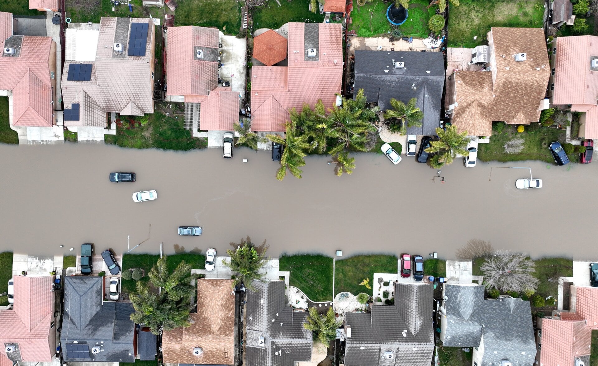 Homes are seen surrounded by floodwaters on January 11, 2023 in Planada, California.