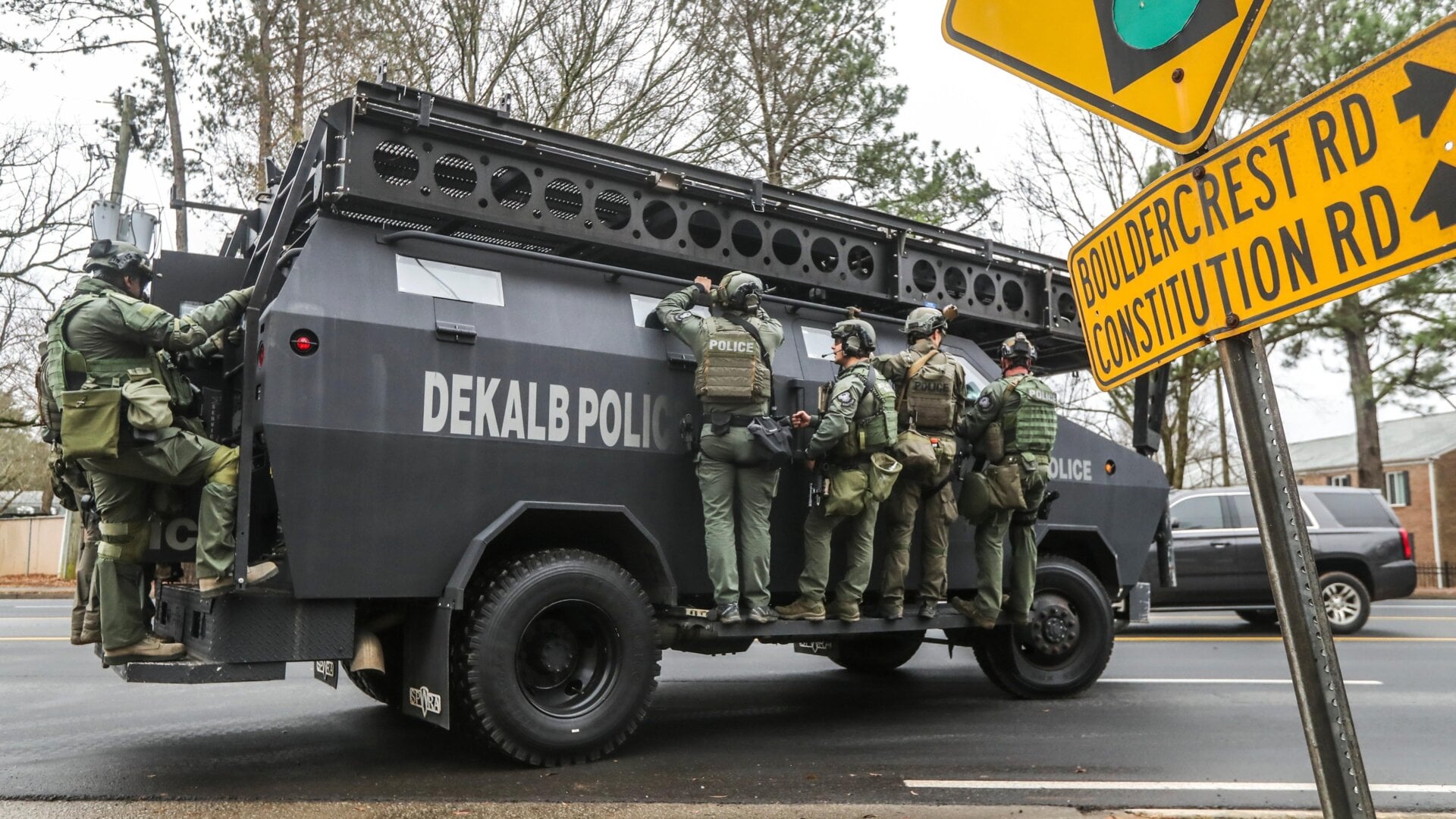 DeKalb, Ga., and Atlanta SWAT members are pictured leaving the Gresham Park command post in Atlanta on Wednesday, Jan. 18, 2023.