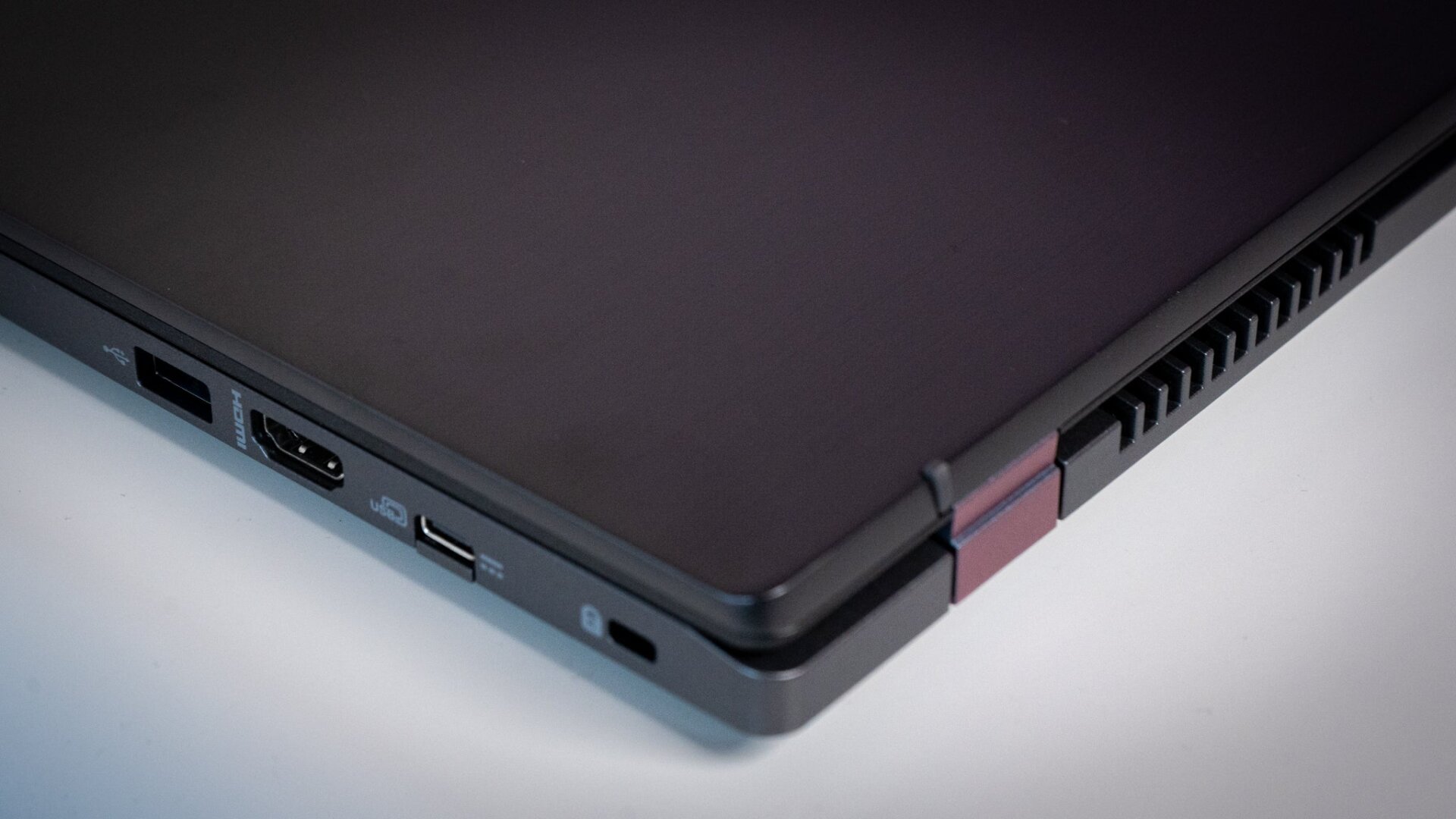 The right side of the Chromebook 516 GE has an HDMI port, a USB-A port, and a USB-C port.