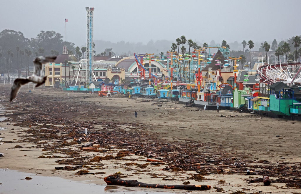  Driftwood storm debris is washed up in front of the Santa Cruz Beach Boardwalk amusement park on January 11, 2023 in Santa Cruz, California. 