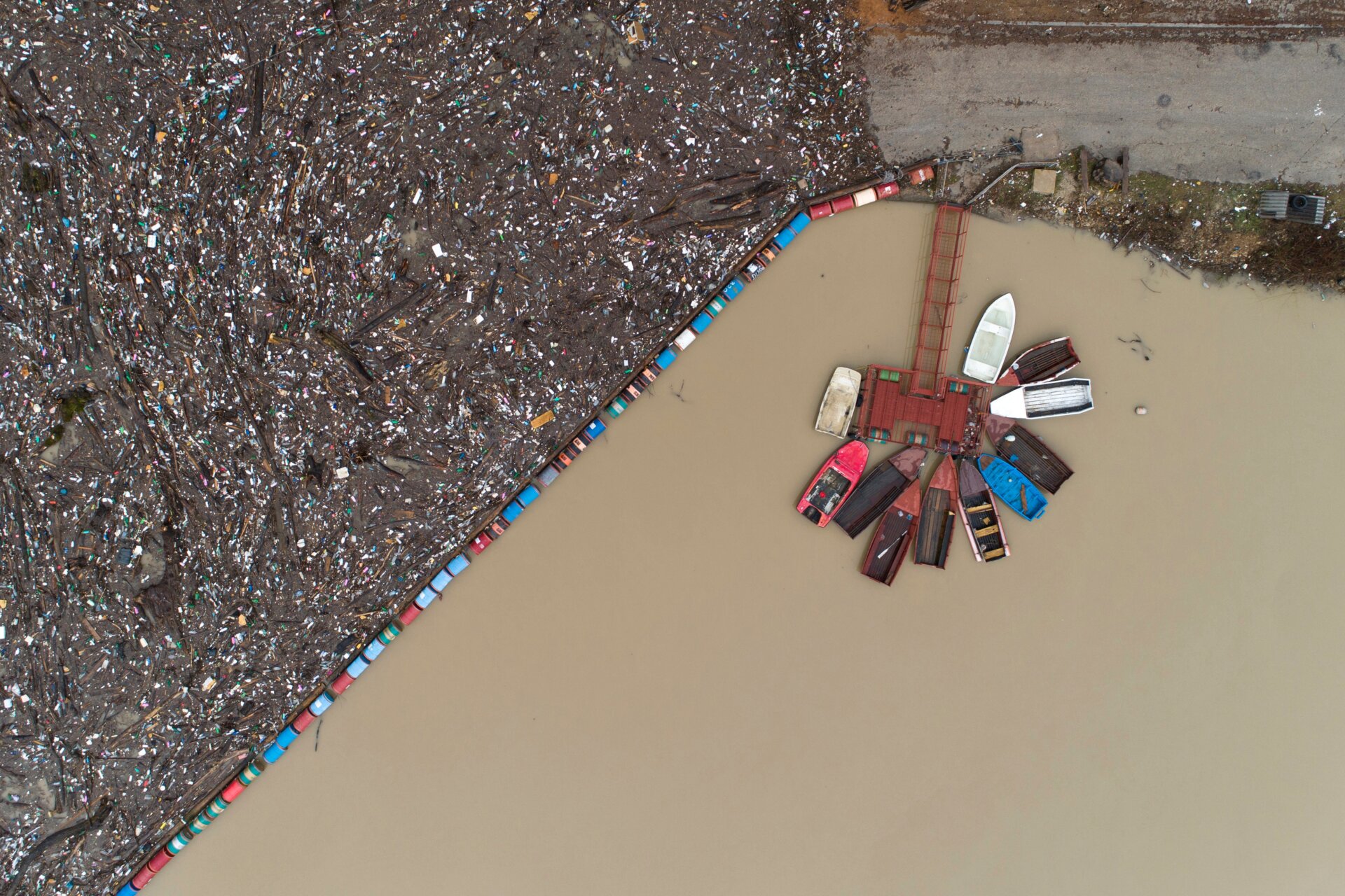 A small dock next to the trash heap. 