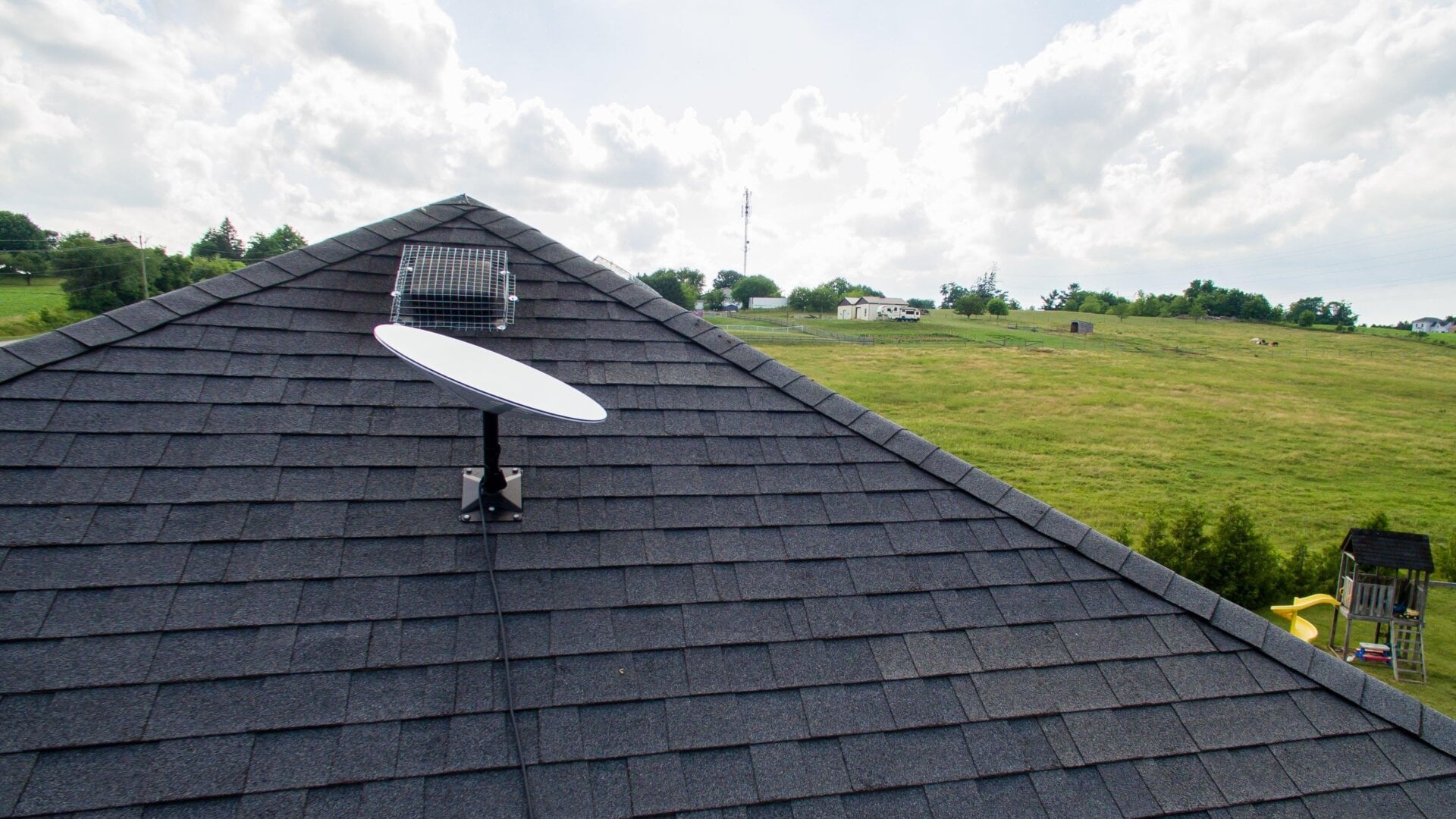 A Starlink dish connected to a home in rural Canada.