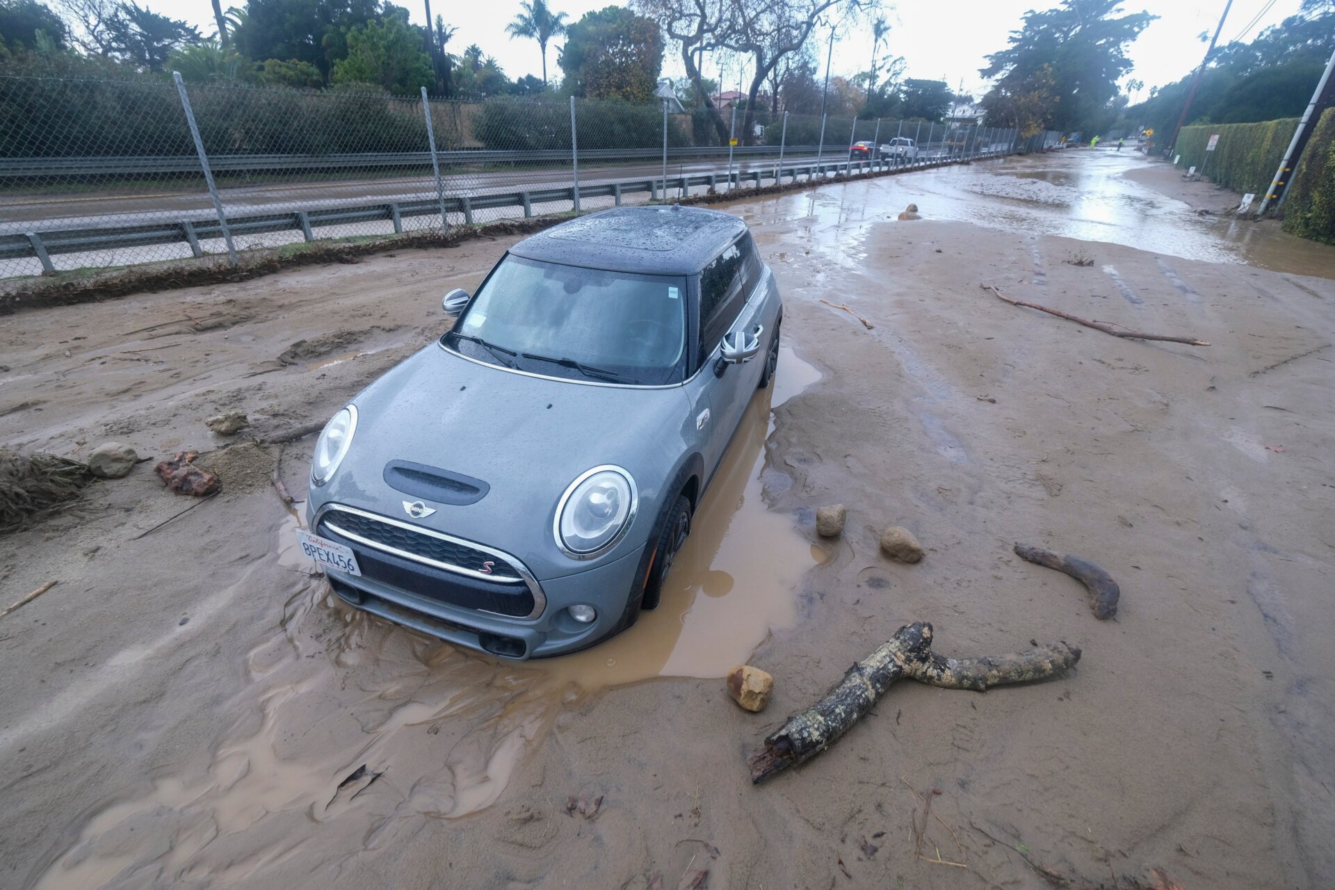 A car trapped by mud in Montecito.