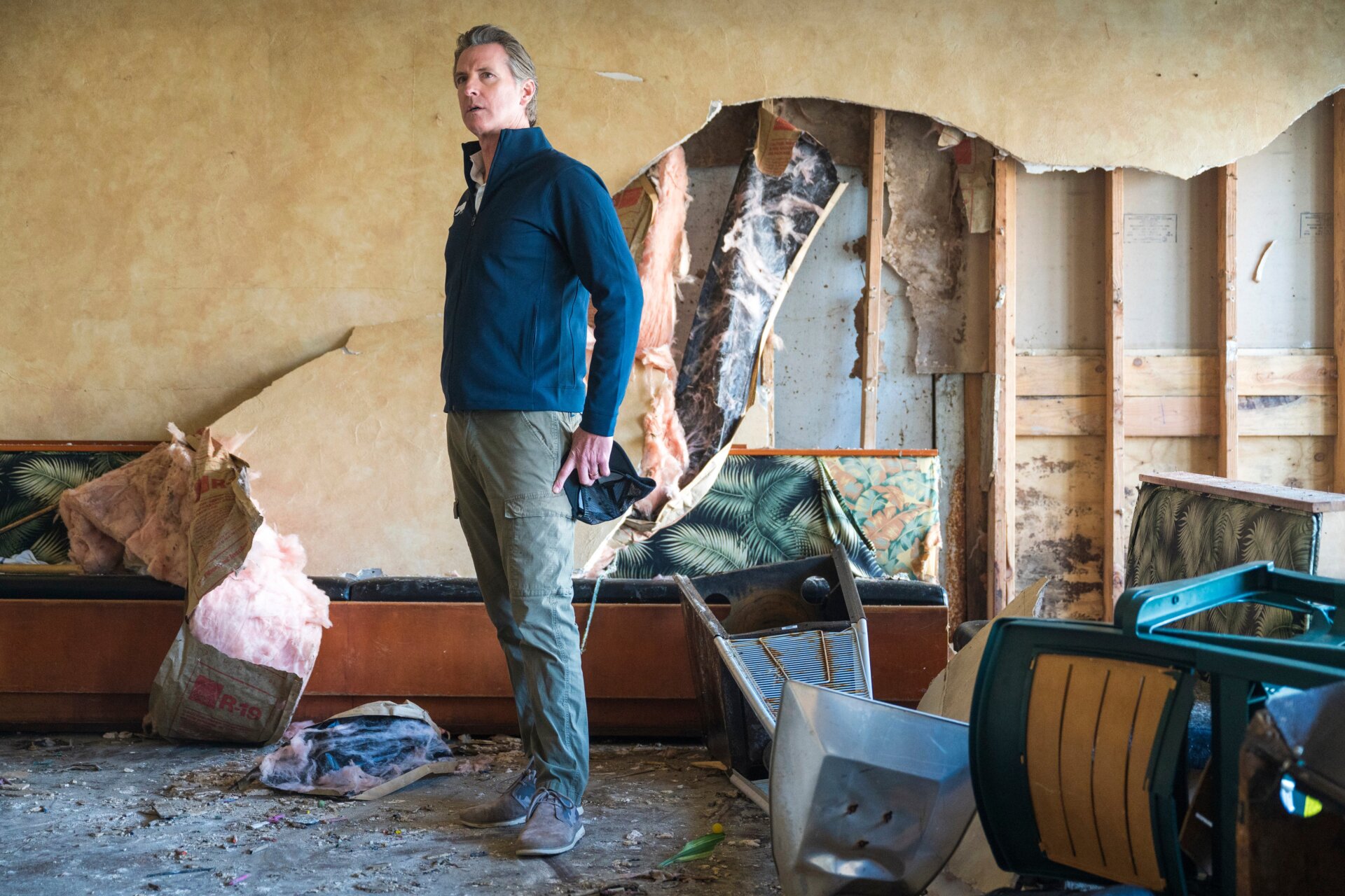 Gov. Gavin Newsom inside a damaged restaurant in Capitola in Santa Cruz County on Tuesday, January 10.