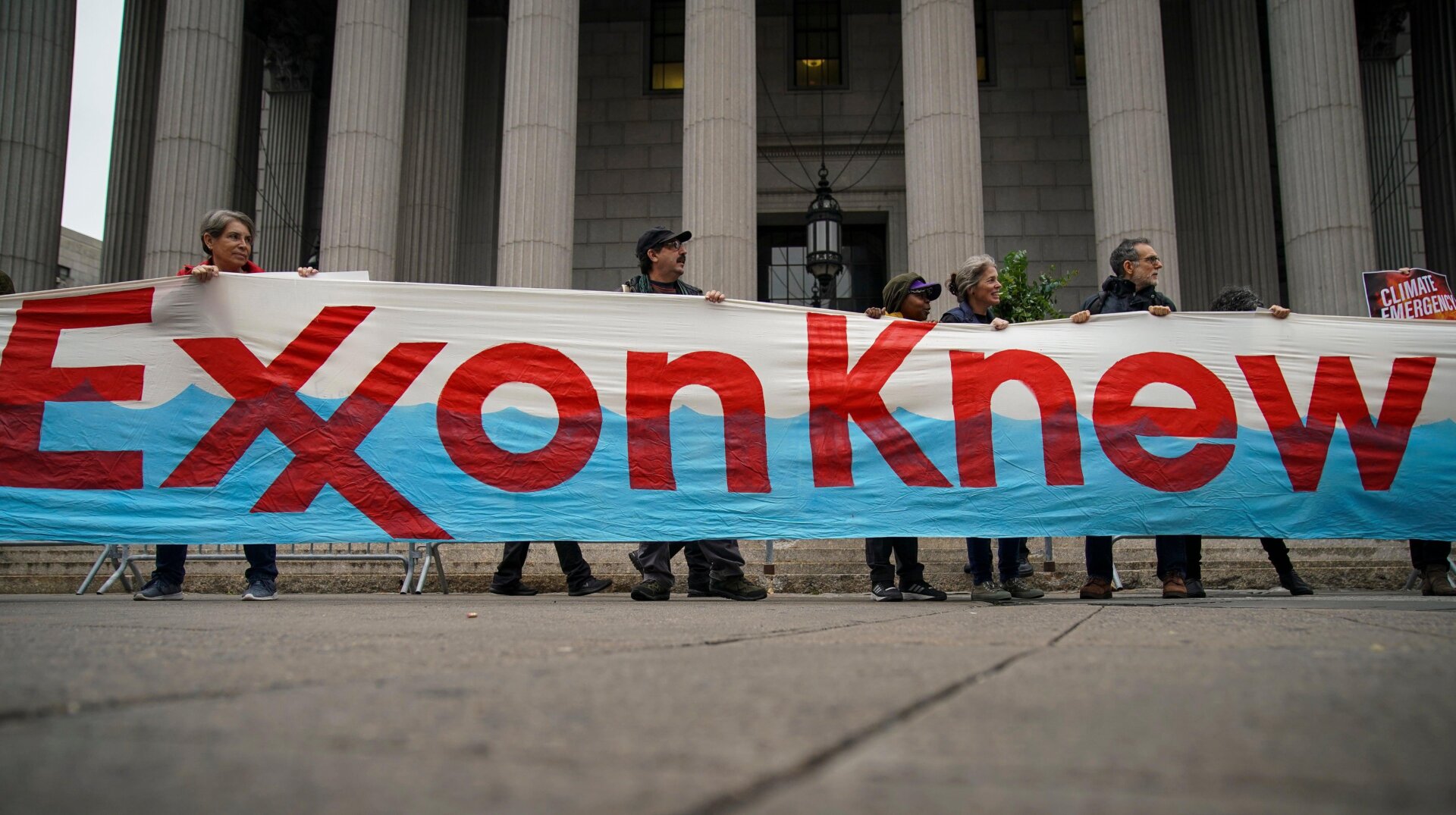 Environmental activists rally for accountability for fossil fuel companies outside of New York Supreme Court on October 22, 2019 in New York City.